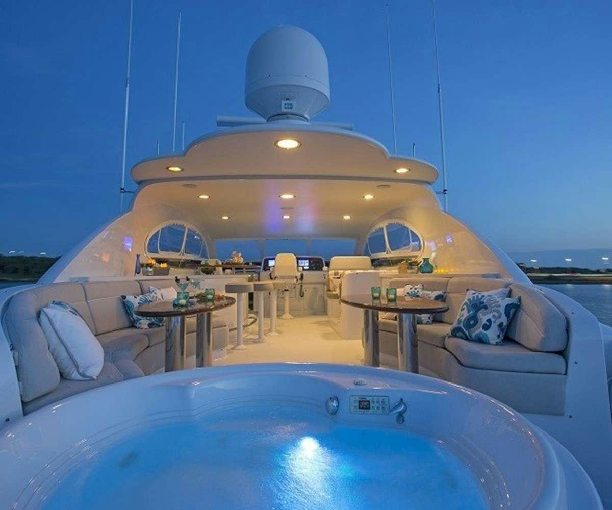 a large swimming pool aboard Passion Yacht for Charter