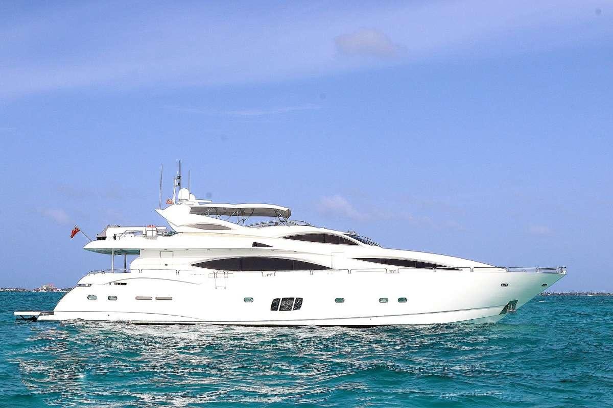 a white yacht in the water aboard YCM 105 Yacht for Charter