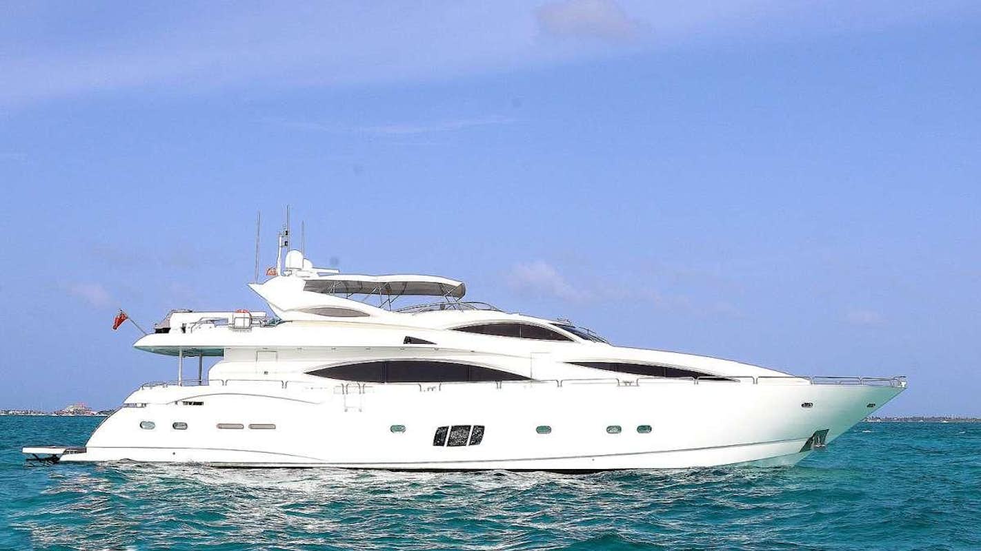 a white yacht in the water aboard YCM 105 Yacht for Charter