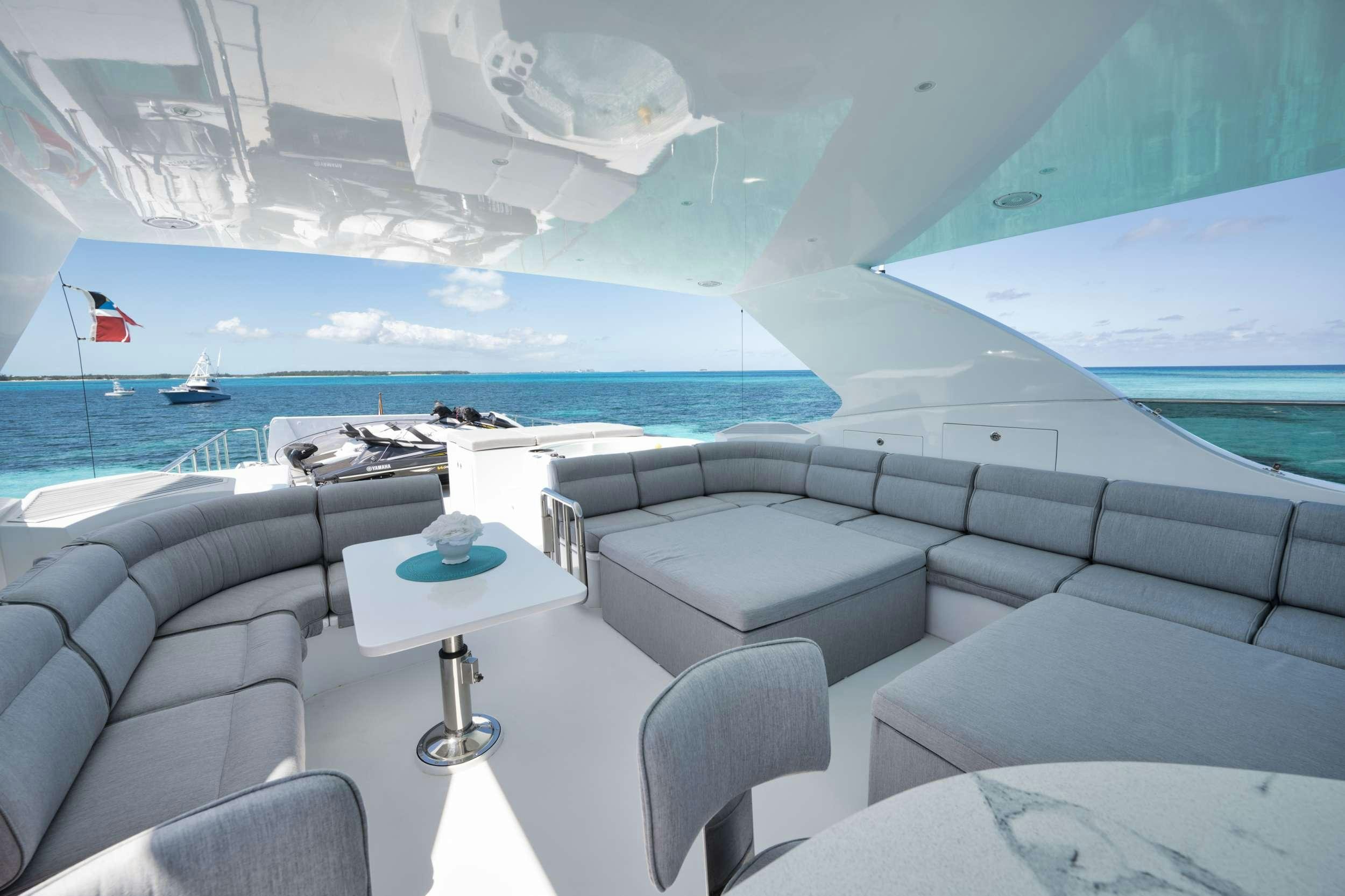 a room with a view of the ocean and the ocean aboard LIMITLESS Yacht for Charter