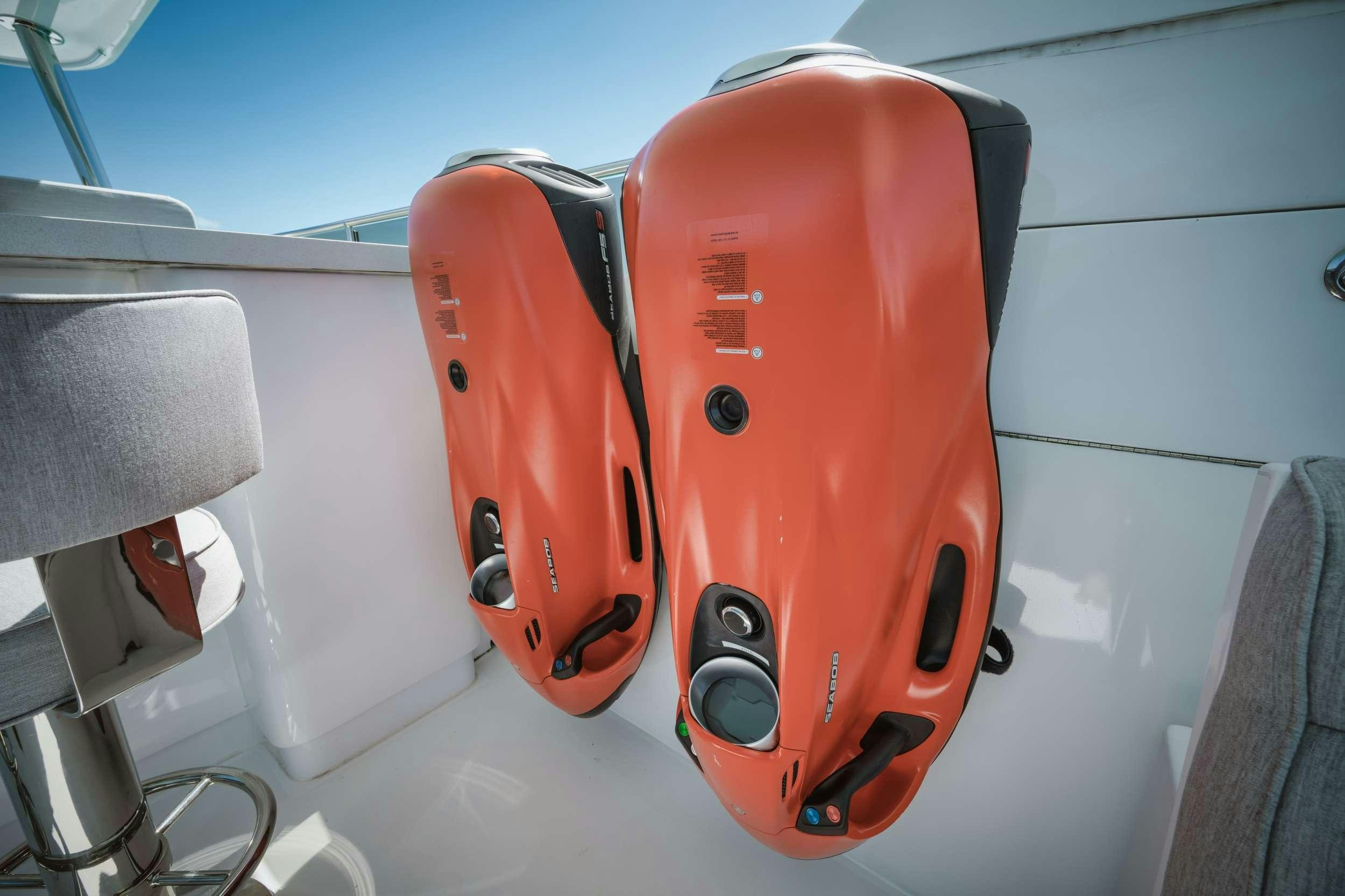 a red and white jet engine aboard LIMITLESS Yacht for Charter