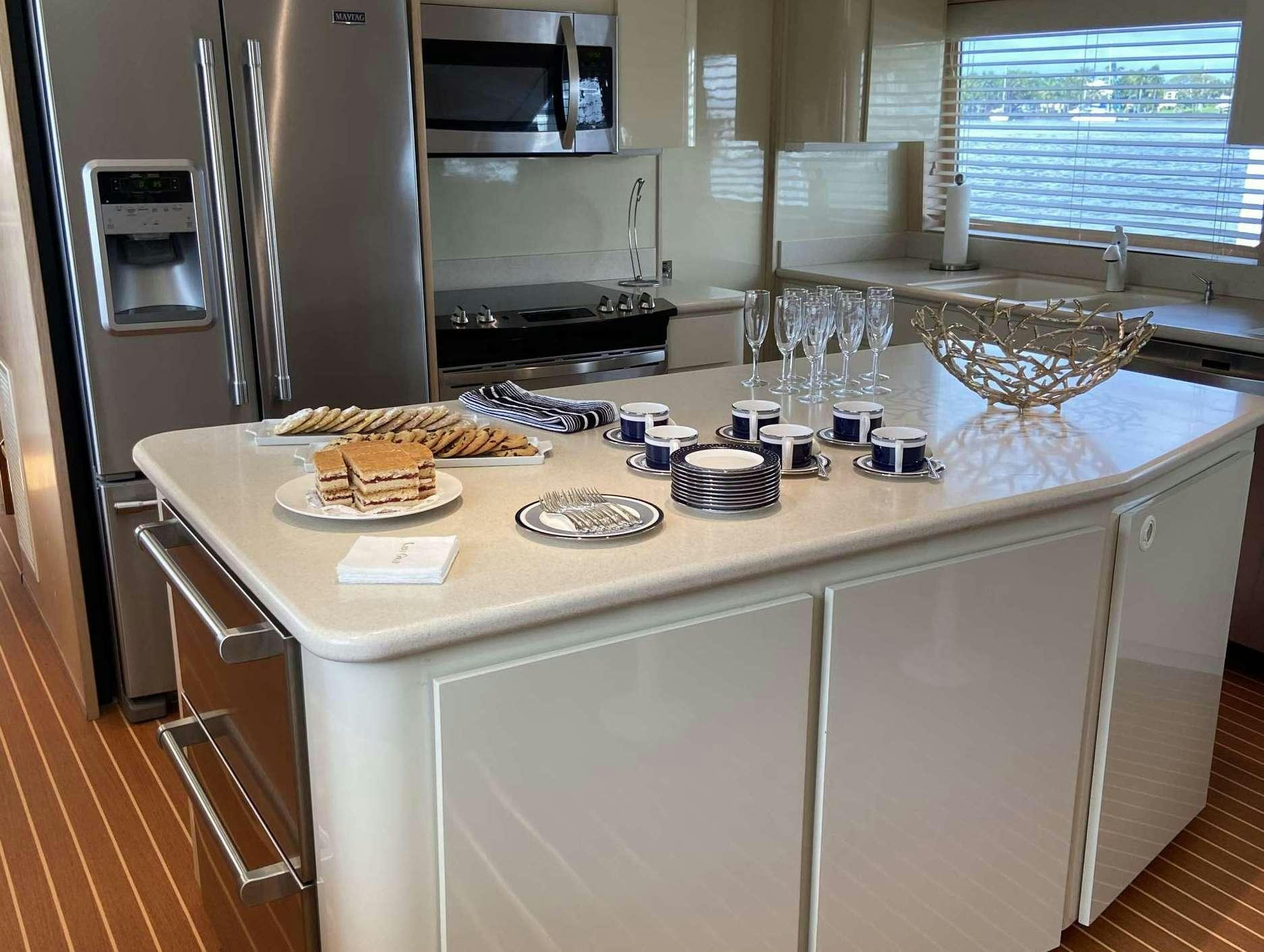 a kitchen with a large island aboard LADY GRAY Yacht for Charter