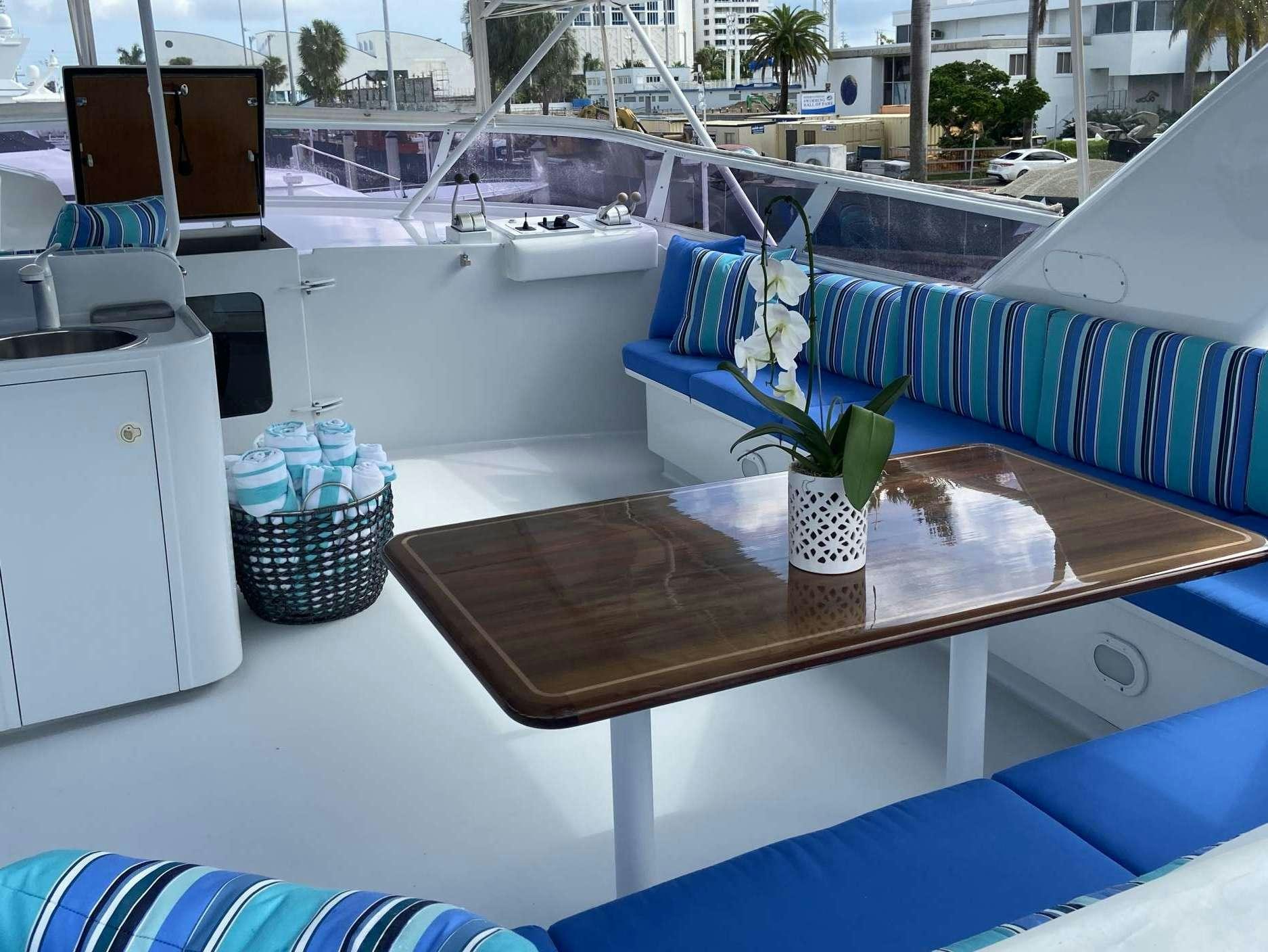 a plant in a pot on a table aboard LADY GRAY Yacht for Charter