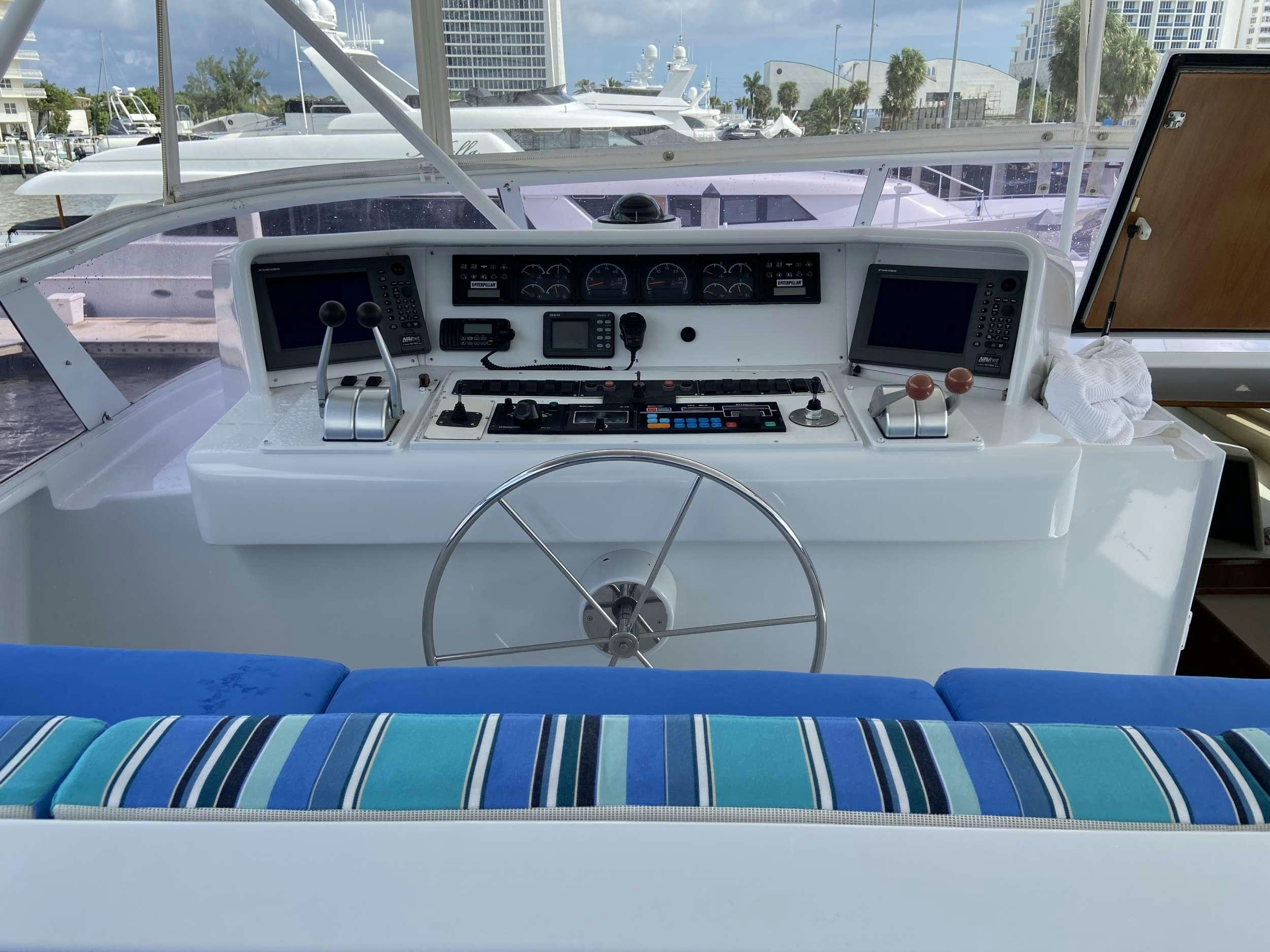 a boat with a steering wheel aboard LADY GRAY Yacht for Charter