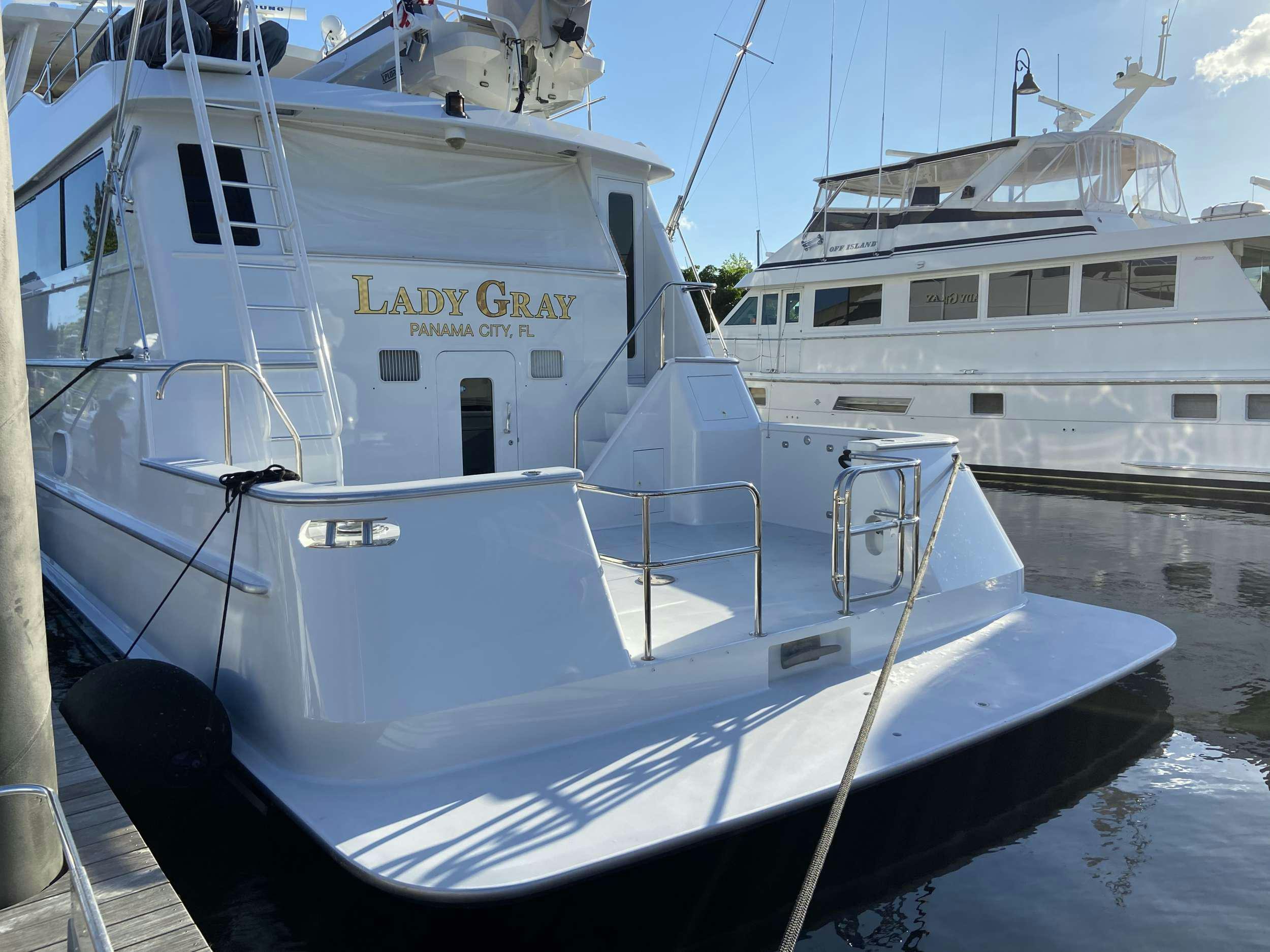 a white boat in the water aboard LADY GRAY Yacht for Charter
