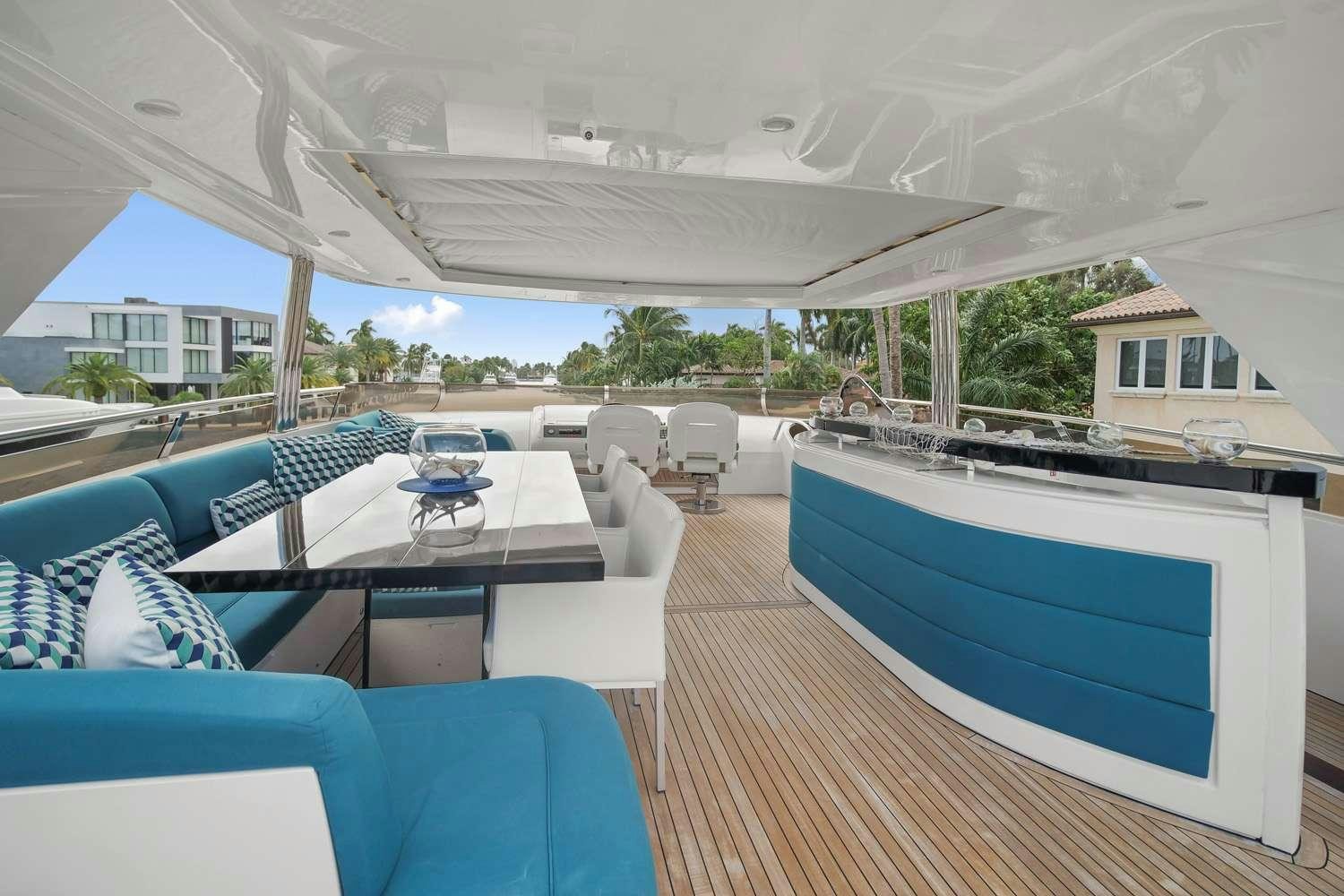 a large patio with a pool aboard 21 SEA SANDS Yacht for Charter
