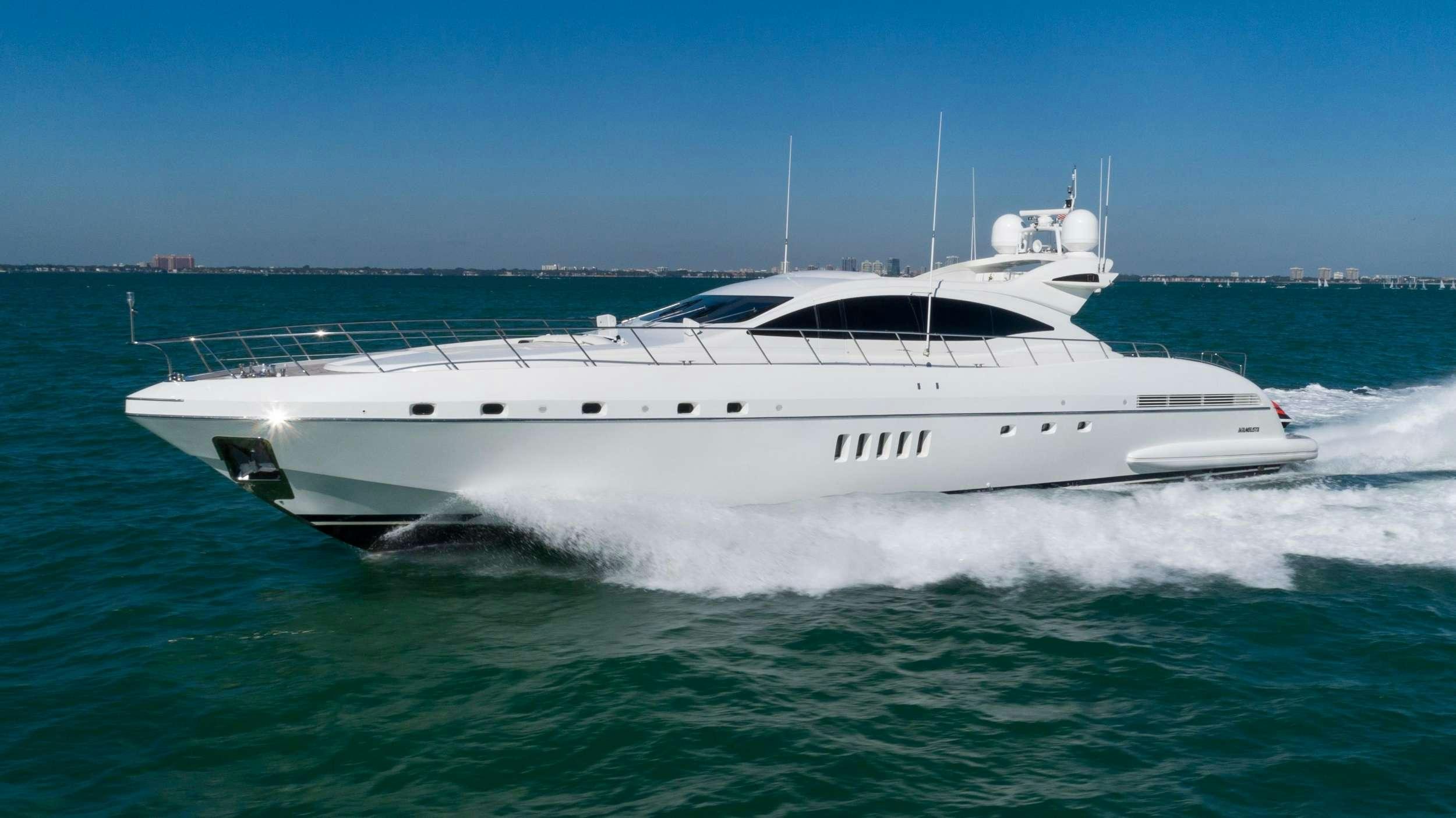 a white yacht in the water aboard HOUDINI Yacht for Charter