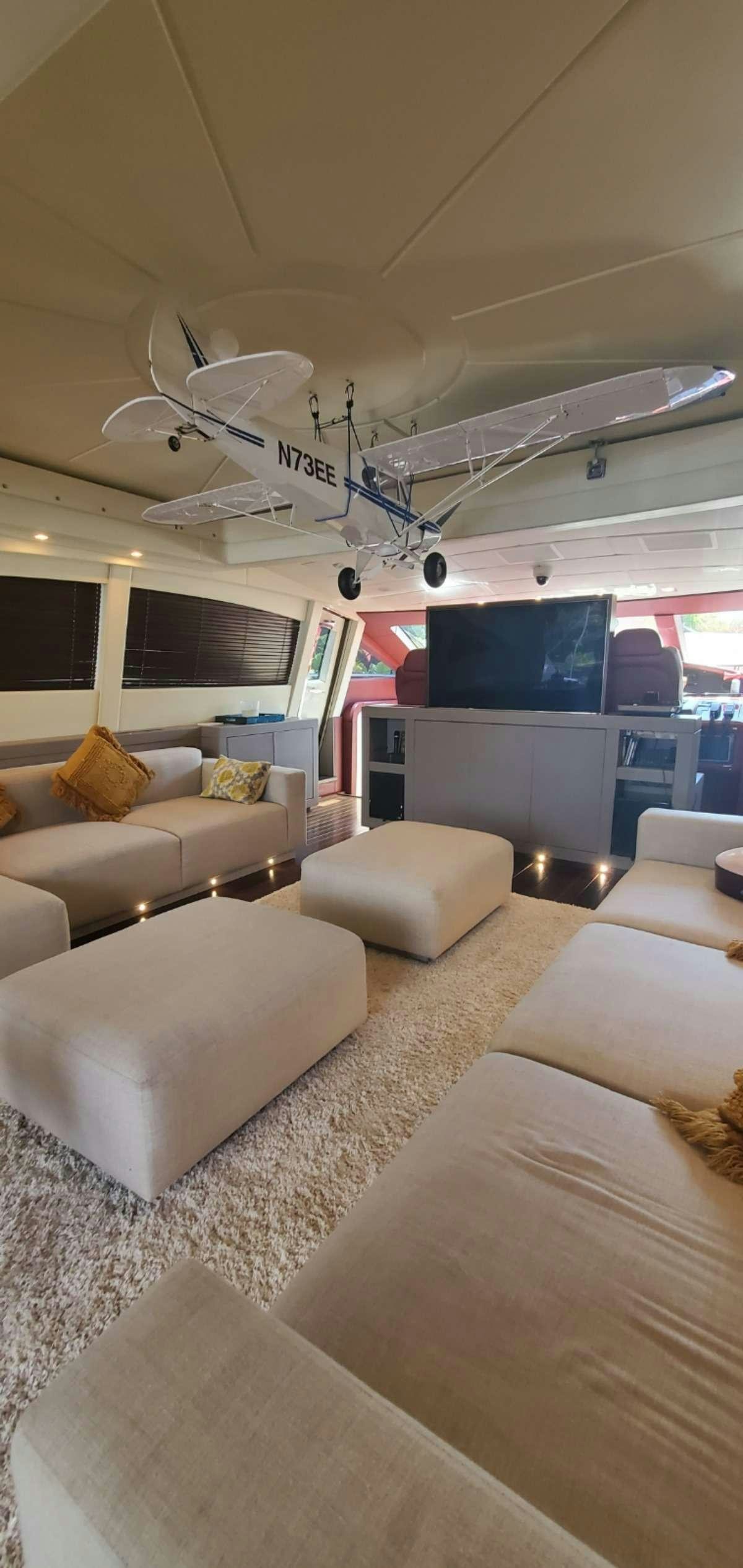 a fan in a living room aboard HOUDINI Yacht for Charter