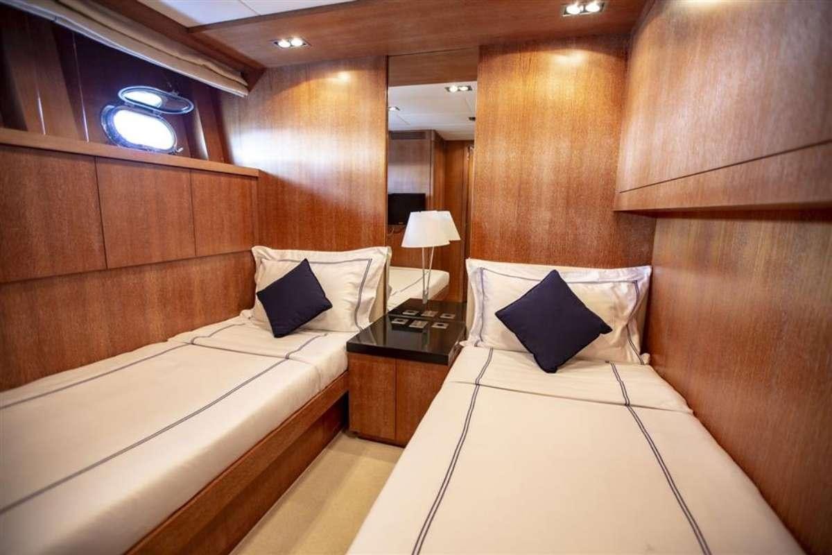 a room with two beds aboard EVA Yacht for Charter