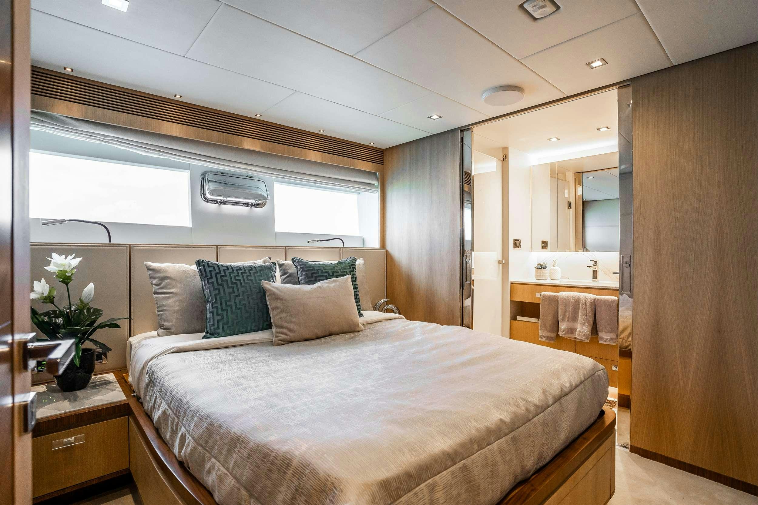 a bed in a room aboard AQUA LIFE Yacht for Charter