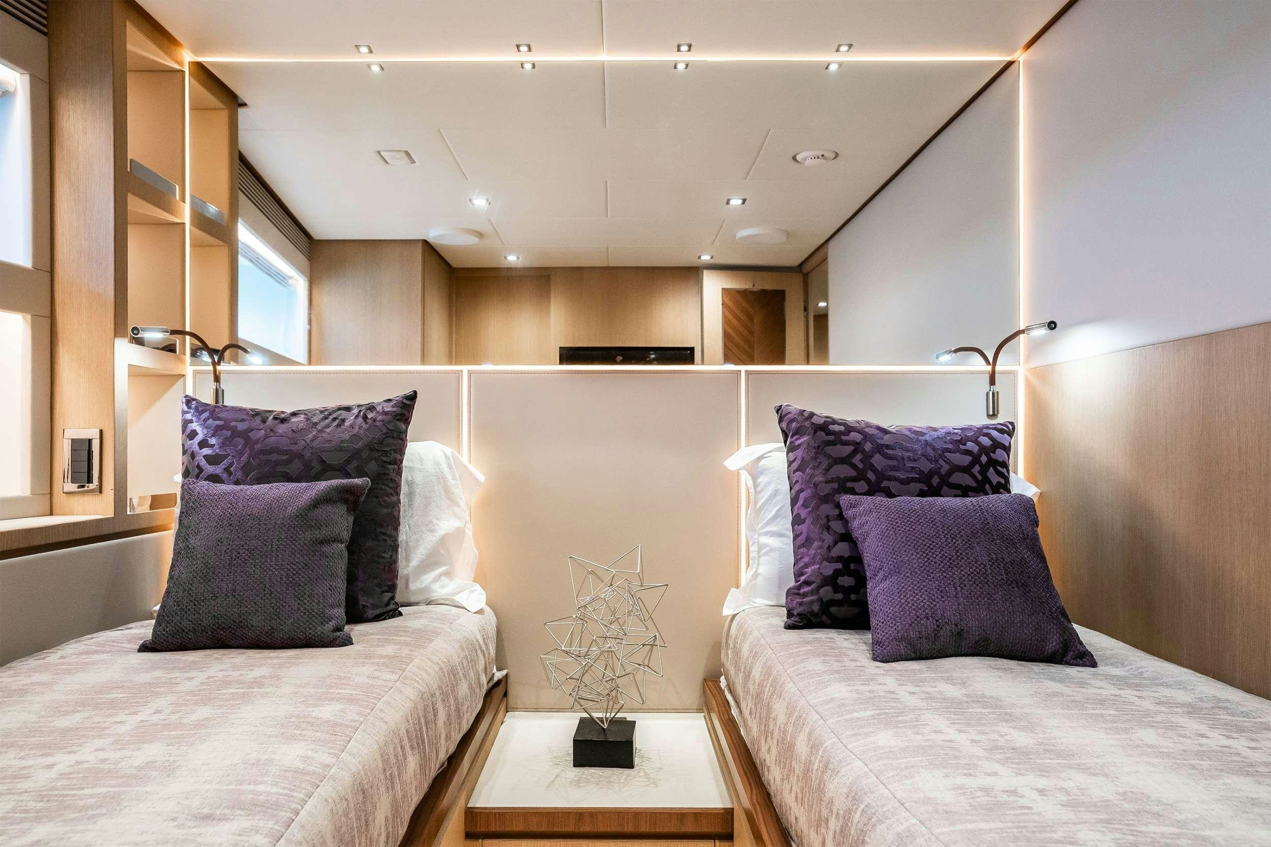 a room with two beds aboard AQUA LIFE Yacht for Charter