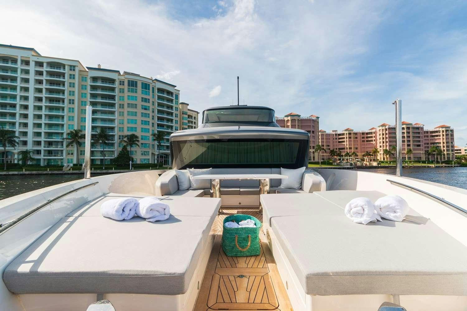 a boat on a water body aboard MON CHATEAU Yacht for Charter