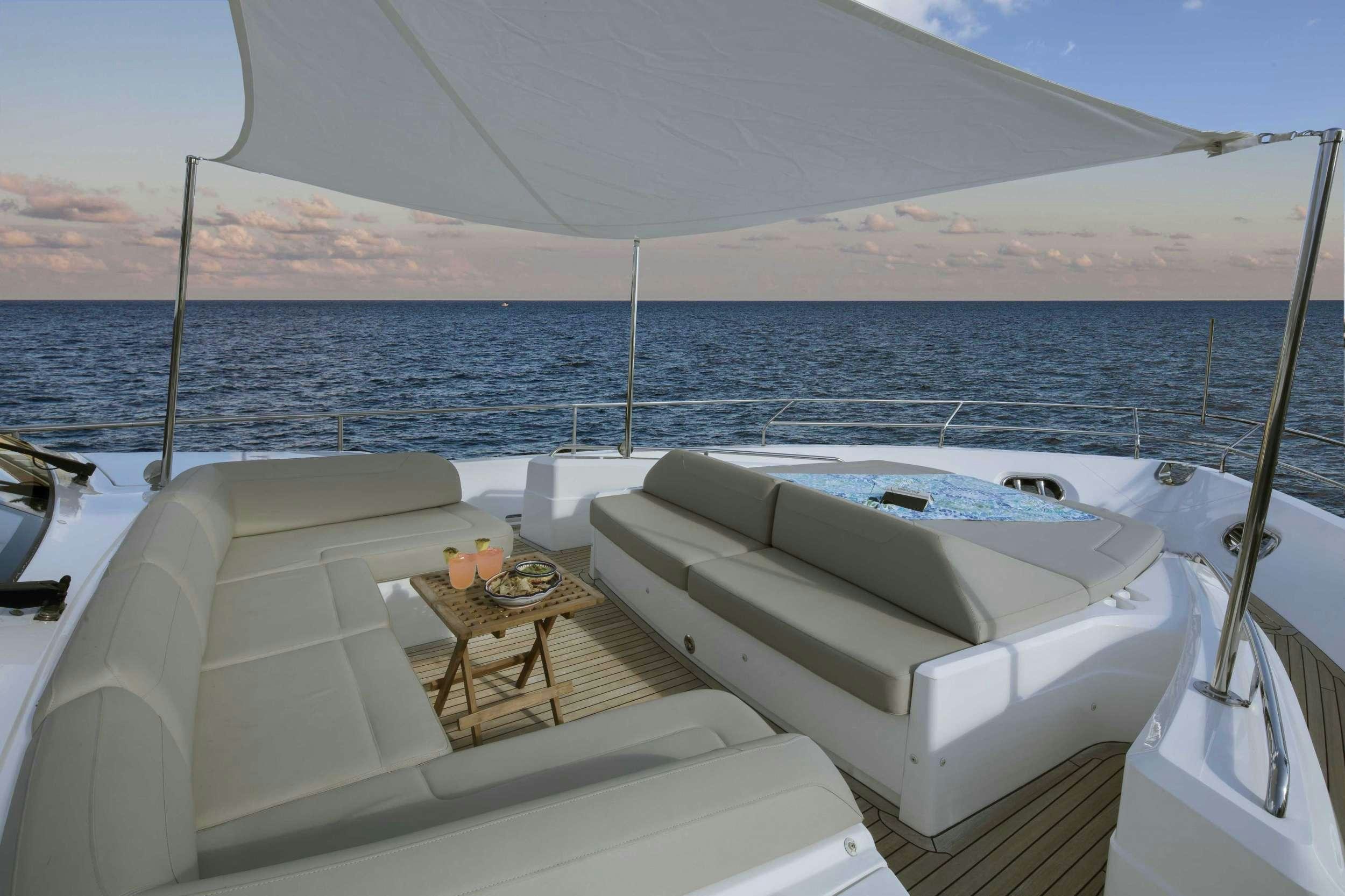 a boat on the water aboard HOT PURSUIT Yacht for Charter