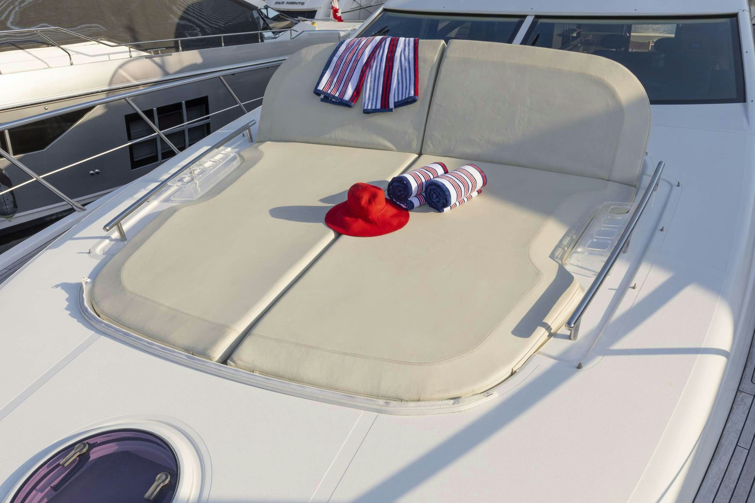 a red rose on a white car aboard DESSERT FIRST Yacht for Charter