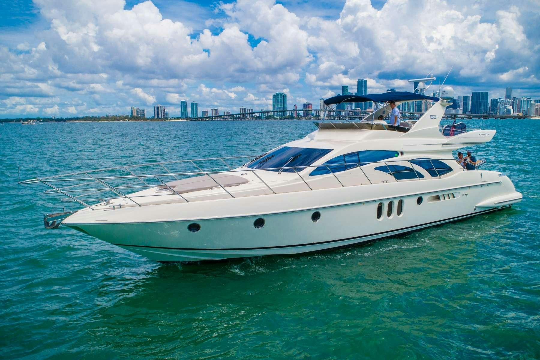 a white yacht in the water aboard ALANA ROSE Yacht for Charter