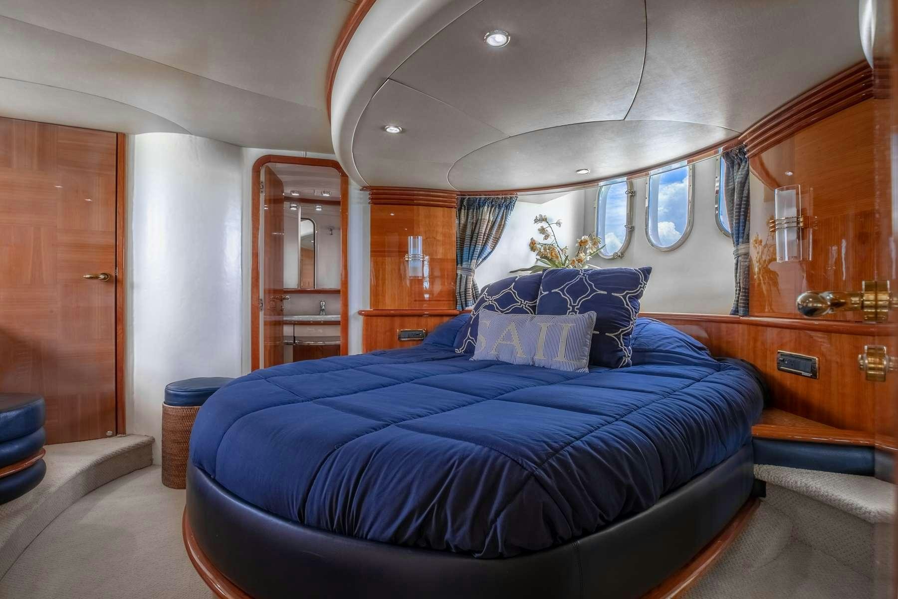 a bed in a room aboard ALANA ROSE Yacht for Charter
