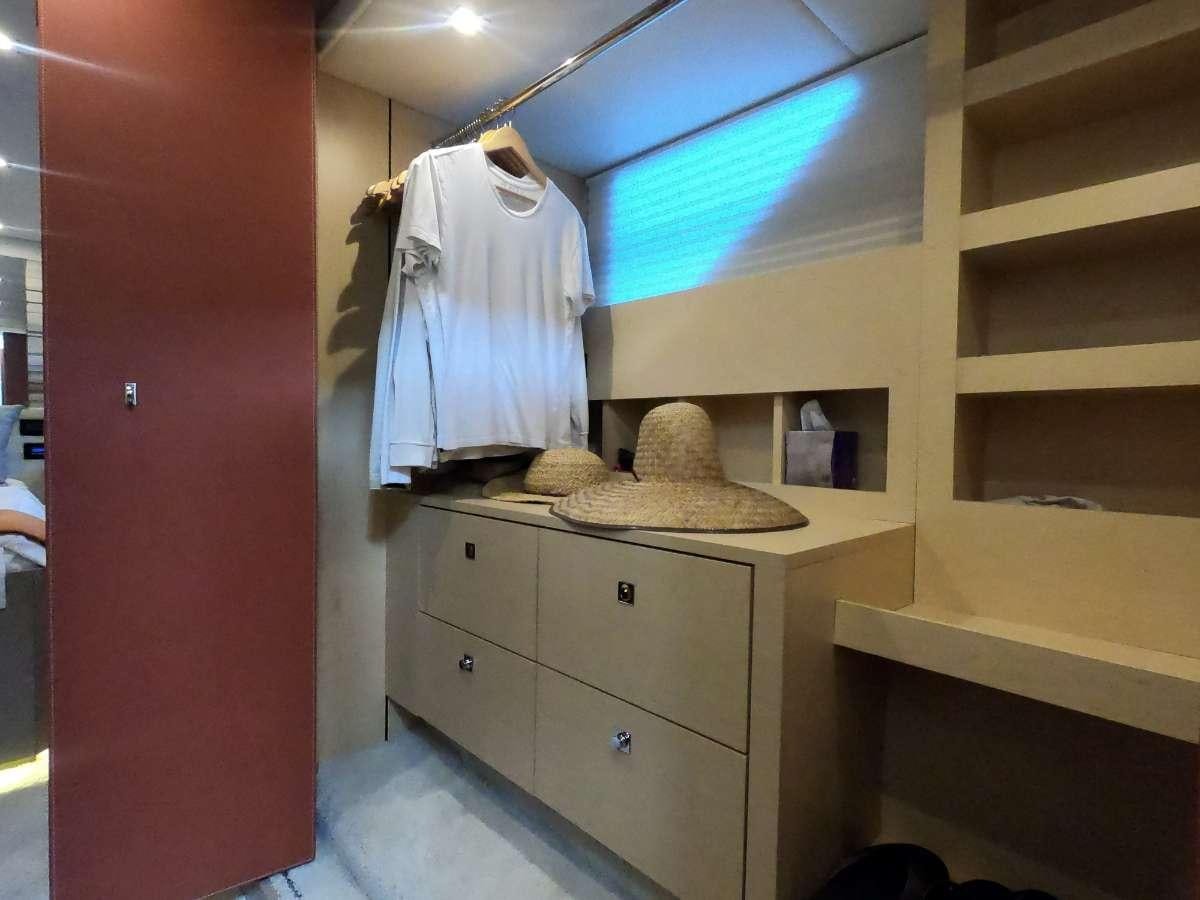 a bathroom with a large mirror aboard RIO Yacht for Charter