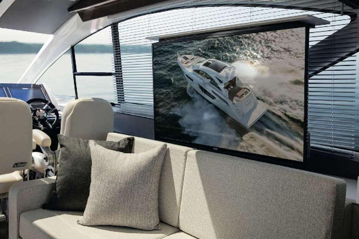 a large screen on a boat aboard RIO Yacht for Charter