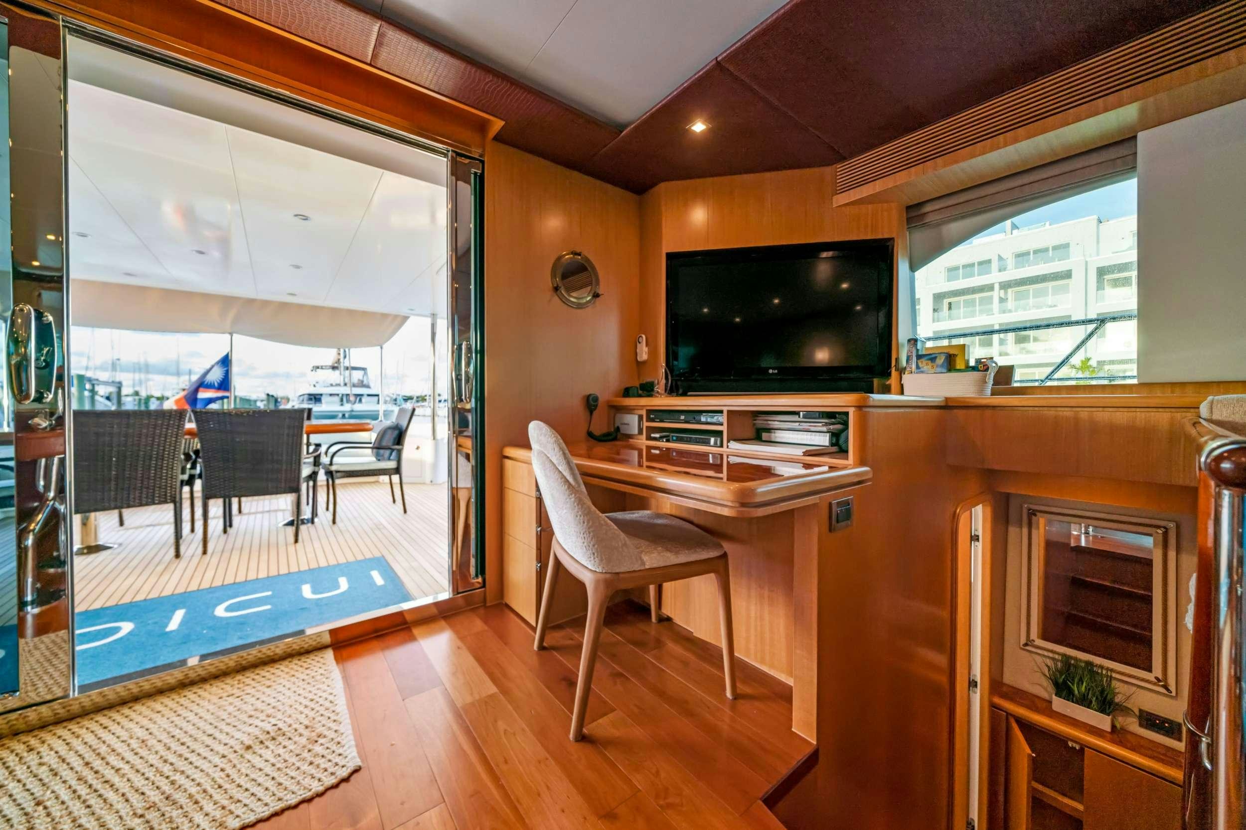 a living room with a pool aboard INDIGO Yacht for Charter