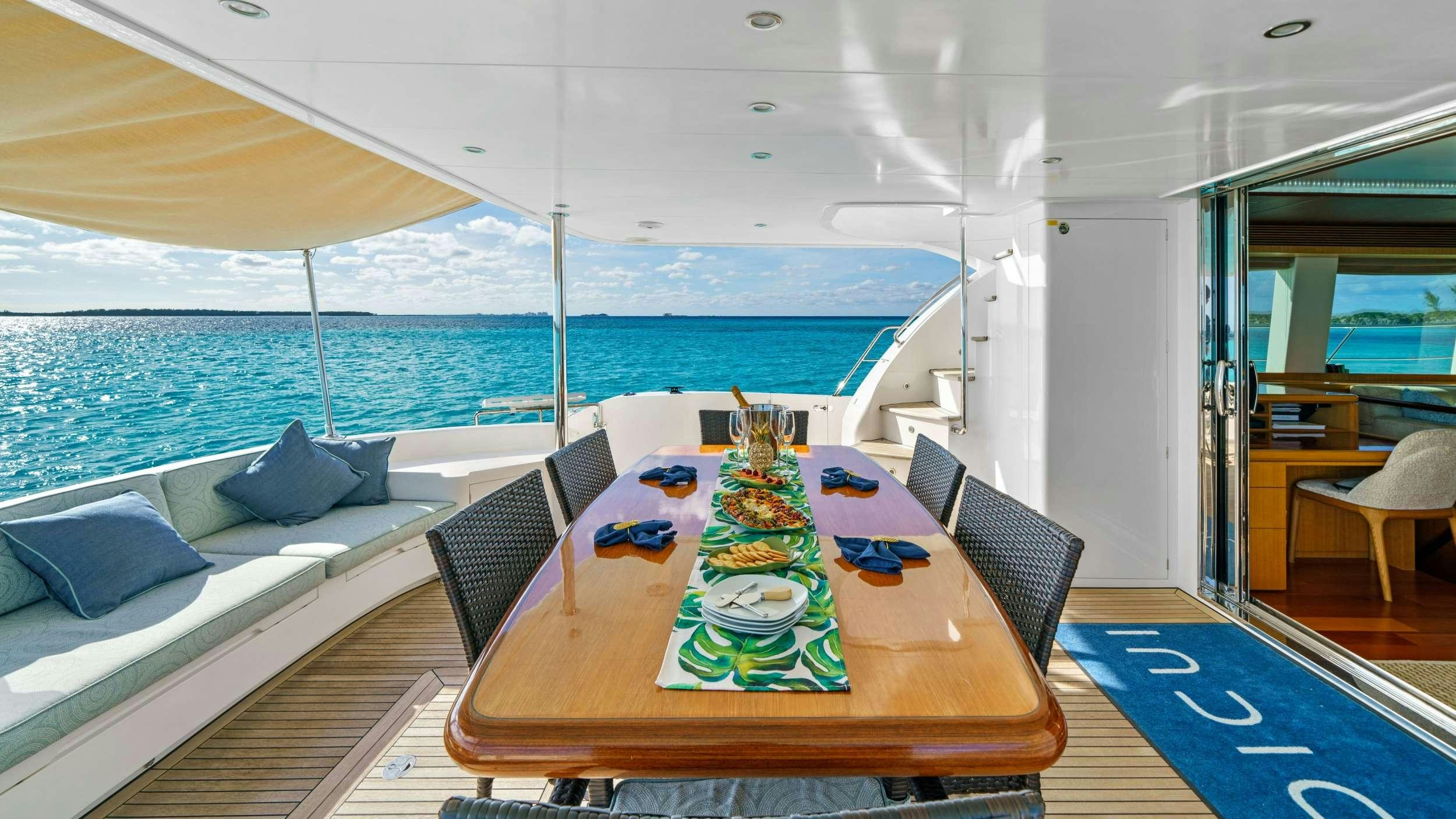 a table with a plate on it aboard INDIGO Yacht for Charter