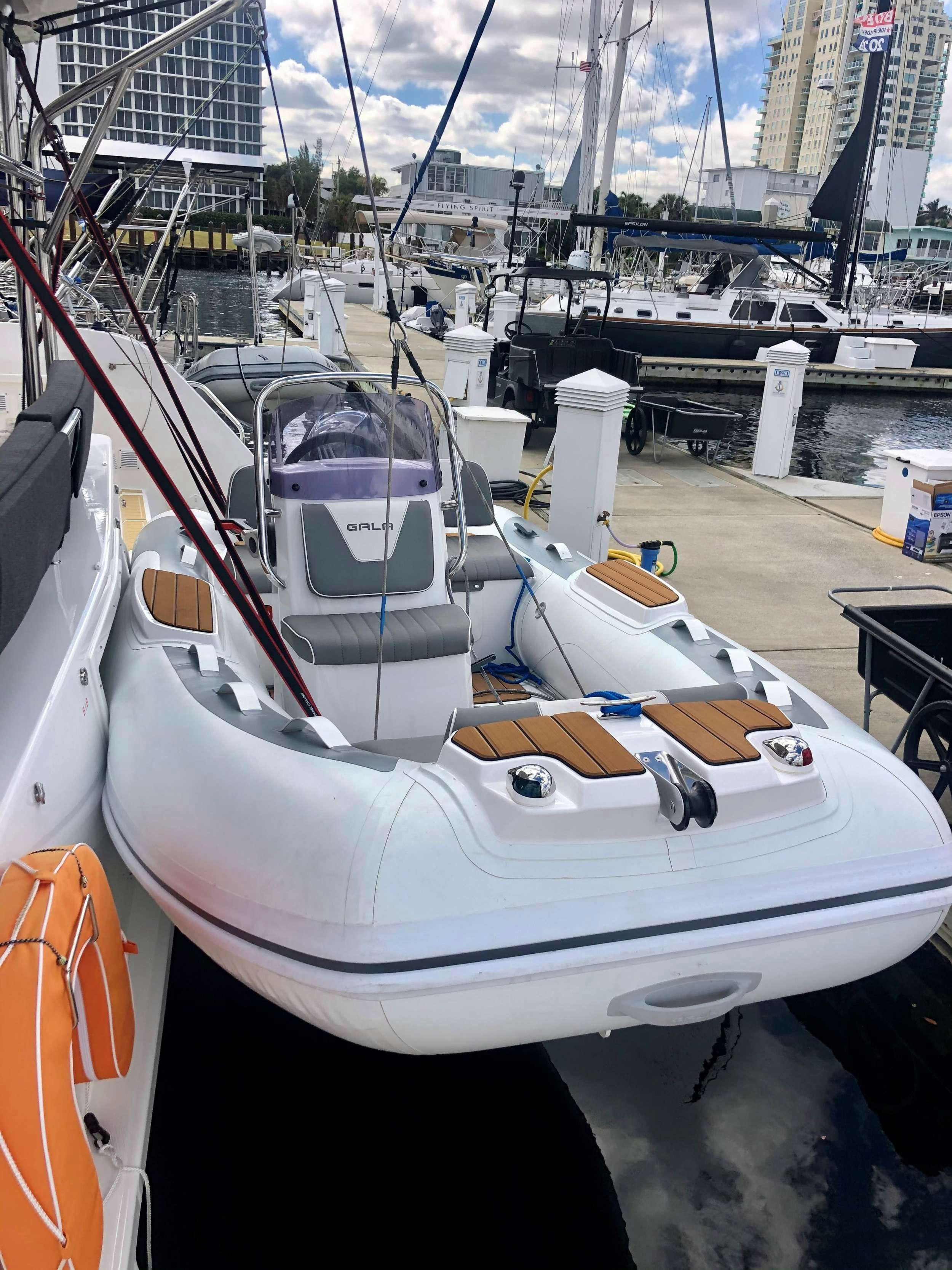 a boat in a harbor aboard MARCH DRAGON Yacht for Charter
