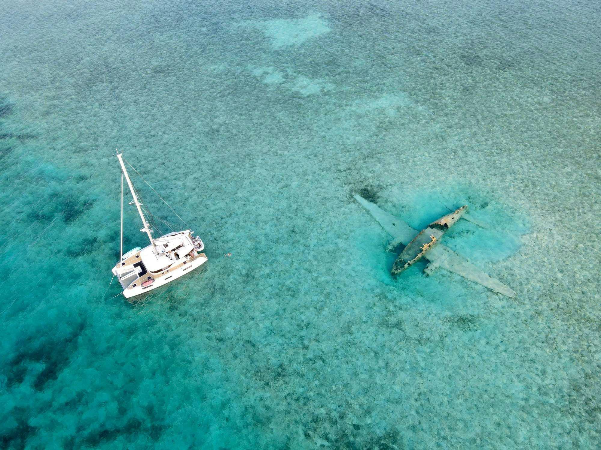 a couple of boats in the ocean aboard MARCH DRAGON Yacht for Charter