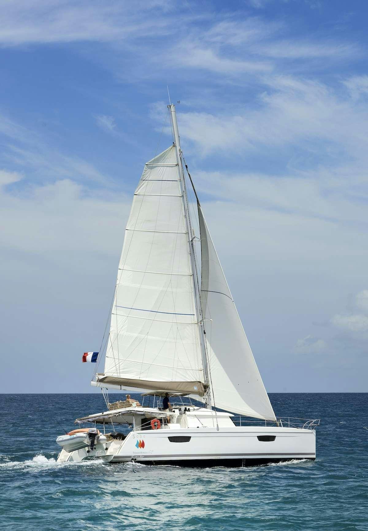 a white boat on the water aboard Cruising TW52 Yacht for Charter