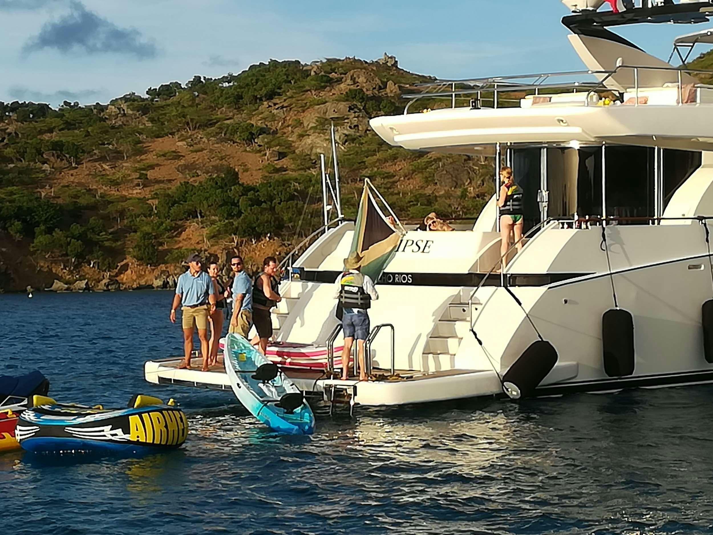 a group of people on a boat aboard ECLIPSE 114 Yacht for Charter