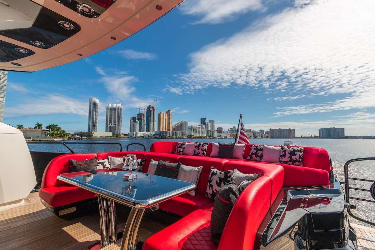 a table and chairs on a boat aboard CANELO Yacht for Charter