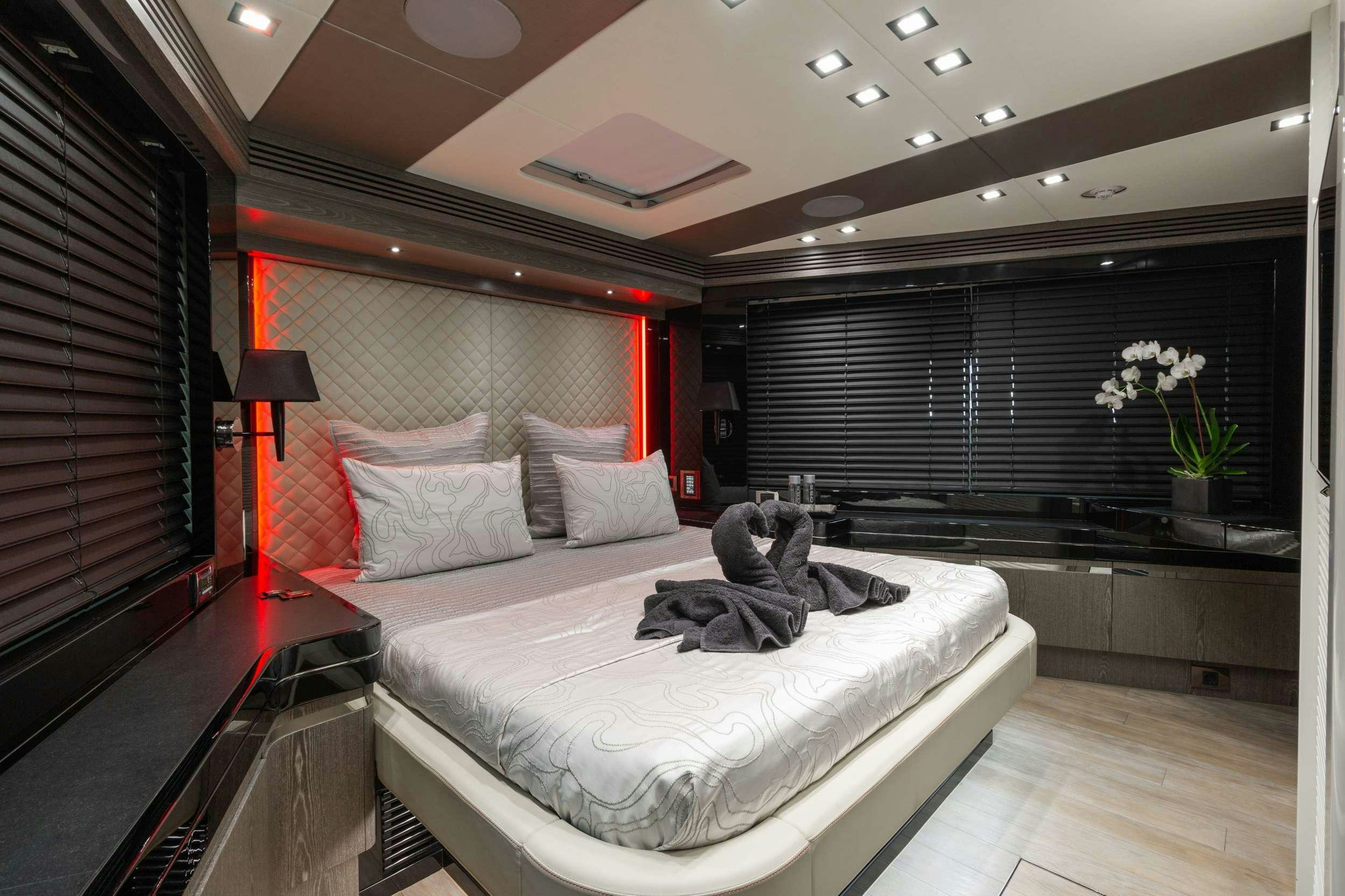 a bed in a room aboard CANELO Yacht for Charter