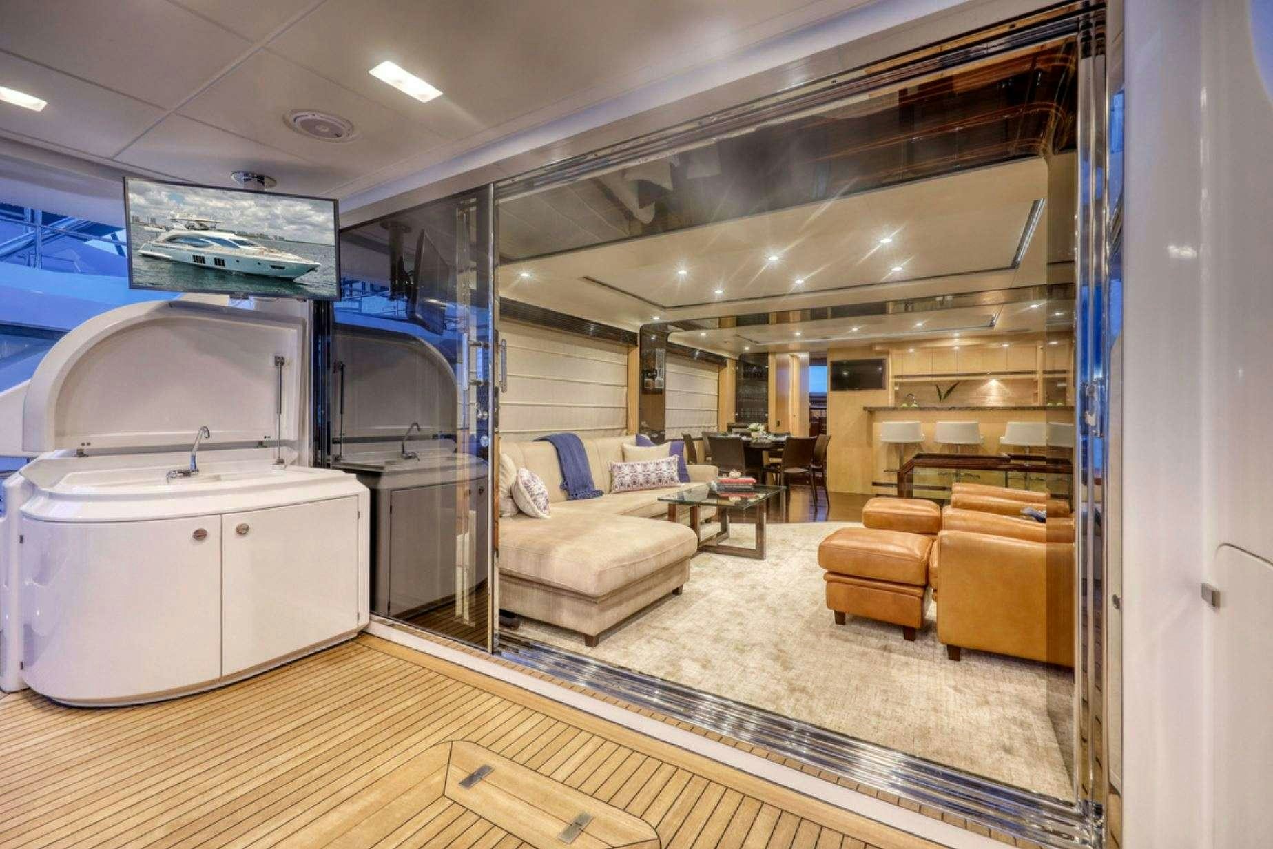 a living room with a large mirror aboard VALERE Yacht for Charter