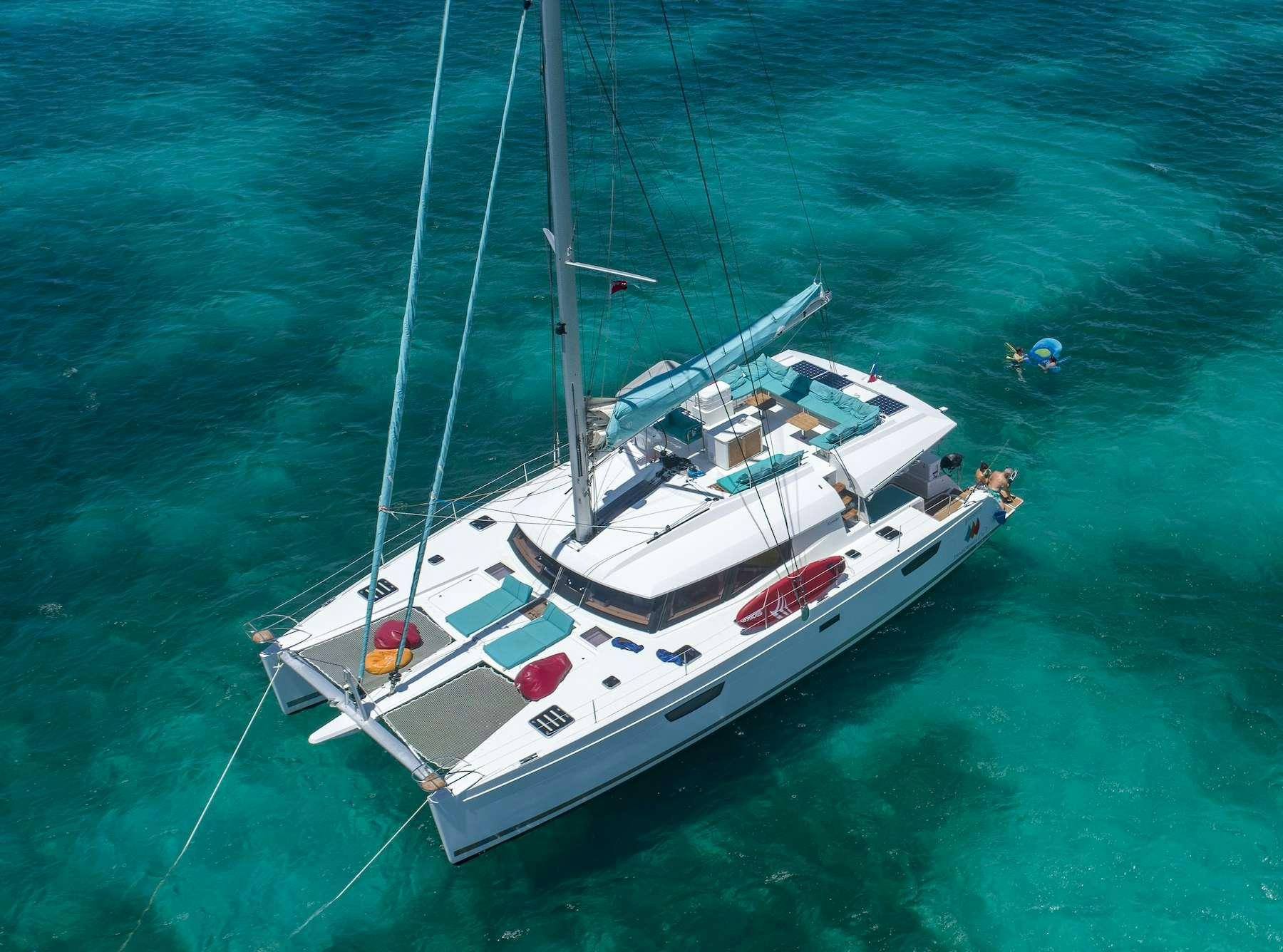 a white boat in the water aboard LUXURY TW60 5 CABIN Yacht for Charter