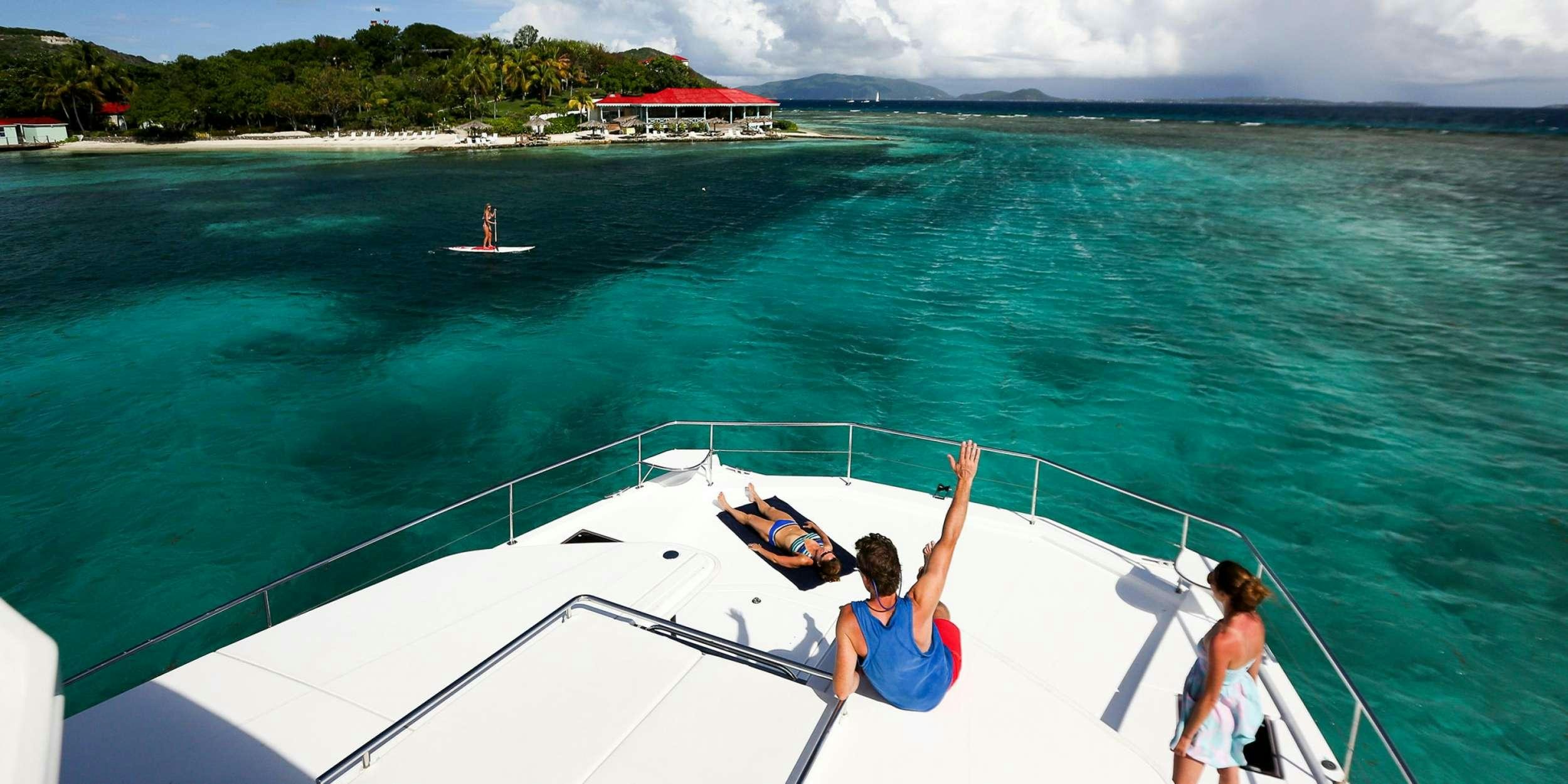 a couple of people on a boat aboard JamSam Yacht for Charter