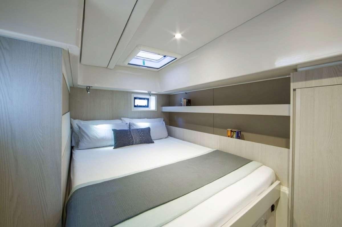 a room with two beds aboard JamSam Yacht for Charter