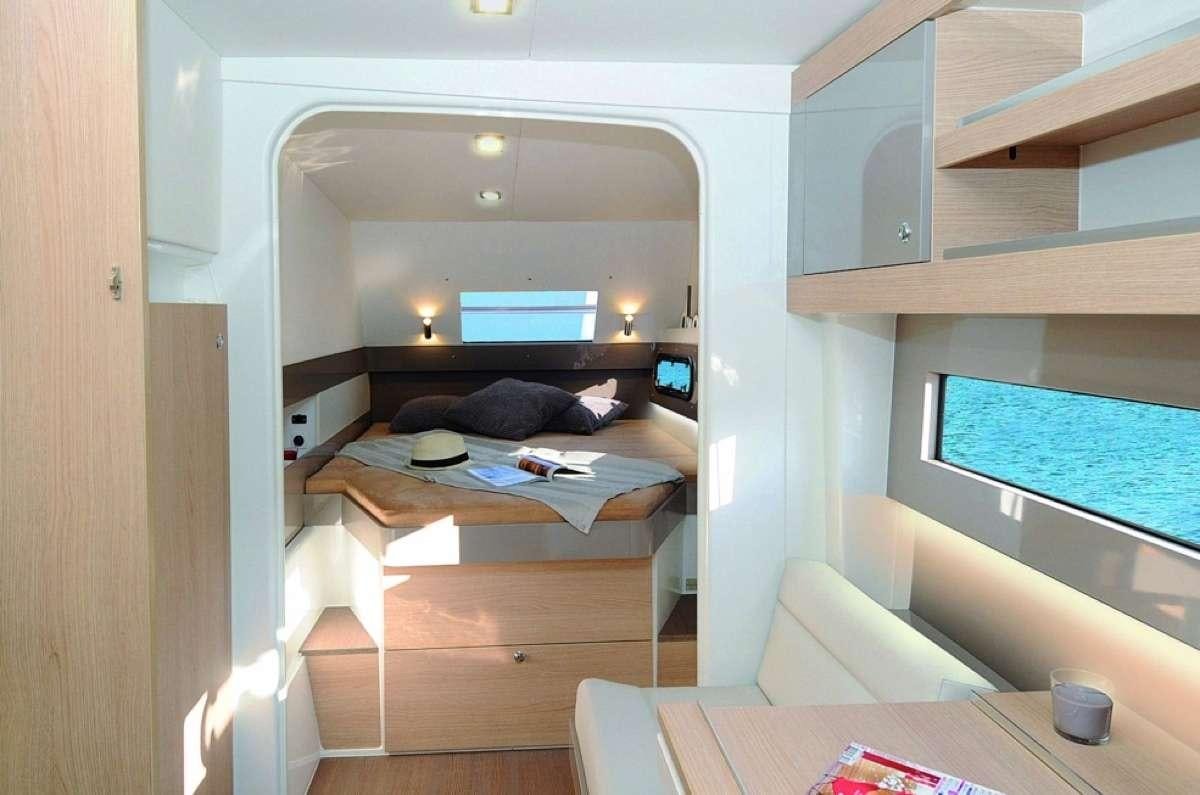 a bed in a room aboard Barbara Jane Yacht for Charter