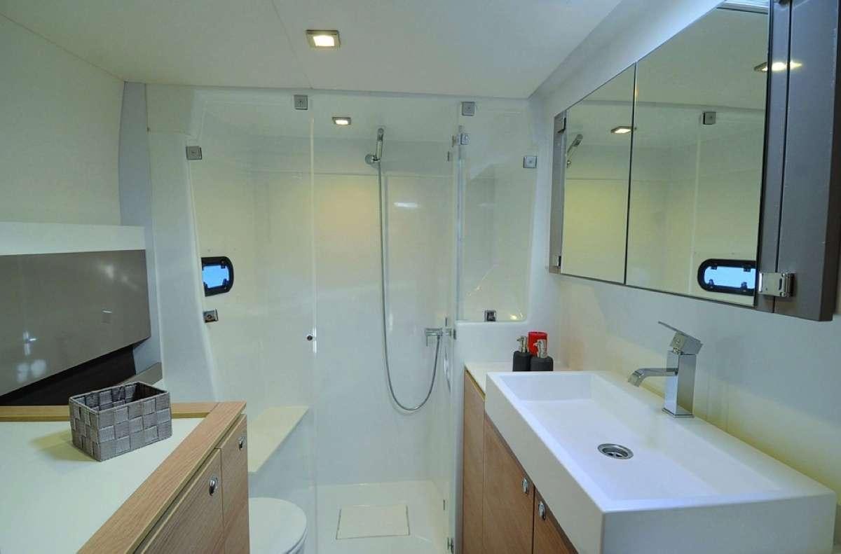 a bathroom with a shower and a sink aboard Barbara Jane Yacht for Charter