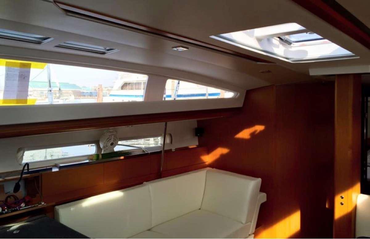 a room with a window and a desk aboard Sea Wolf Yacht for Charter