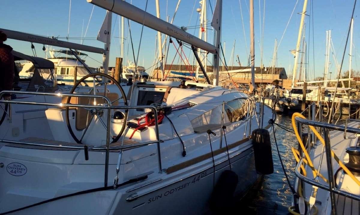 a boat docked at a pier aboard Sea Wolf Yacht for Charter