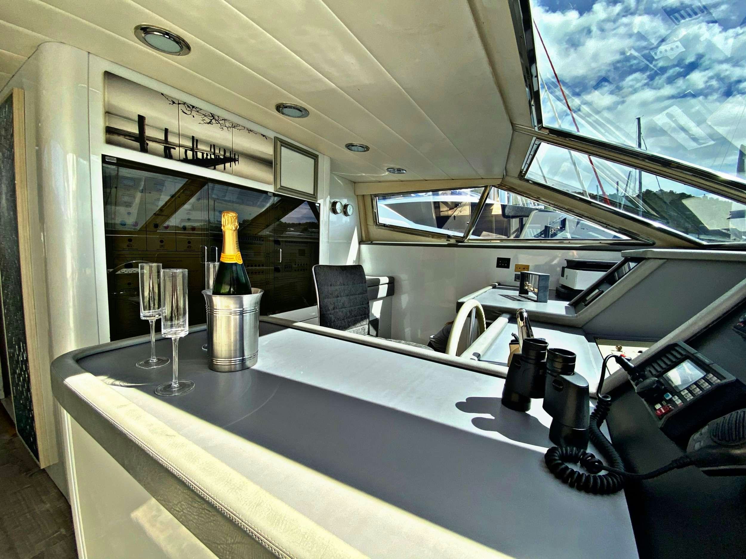 a bottle of wine on a counter aboard RUNAWAY OF TORTOLA Yacht for Charter