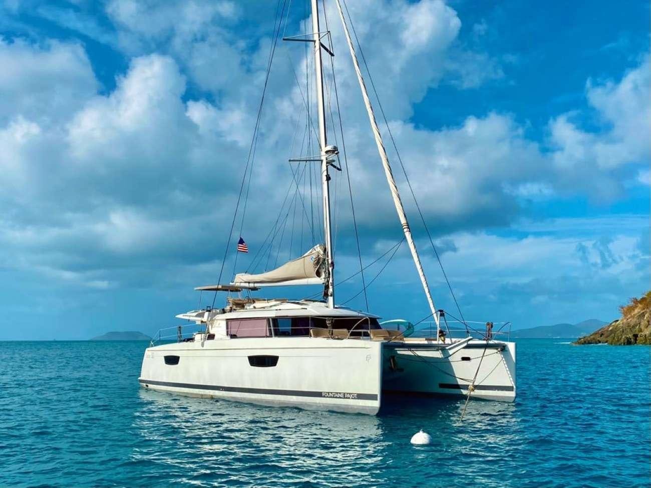 a boat on the water aboard OCEANFRONT PROPERTY Yacht for Charter