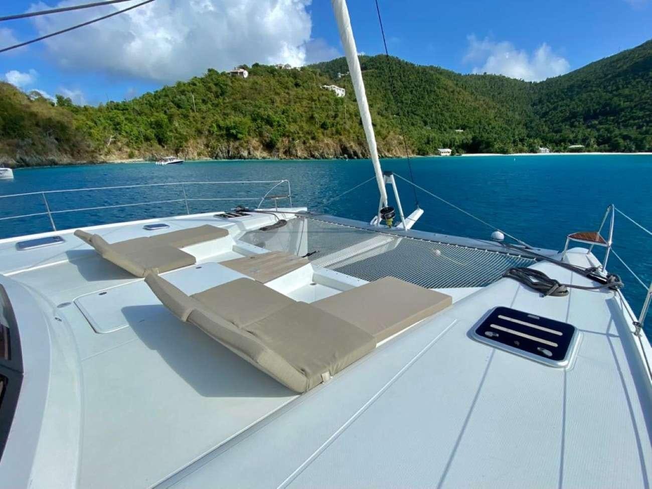 a boat on the water aboard OCEANFRONT PROPERTY Yacht for Charter