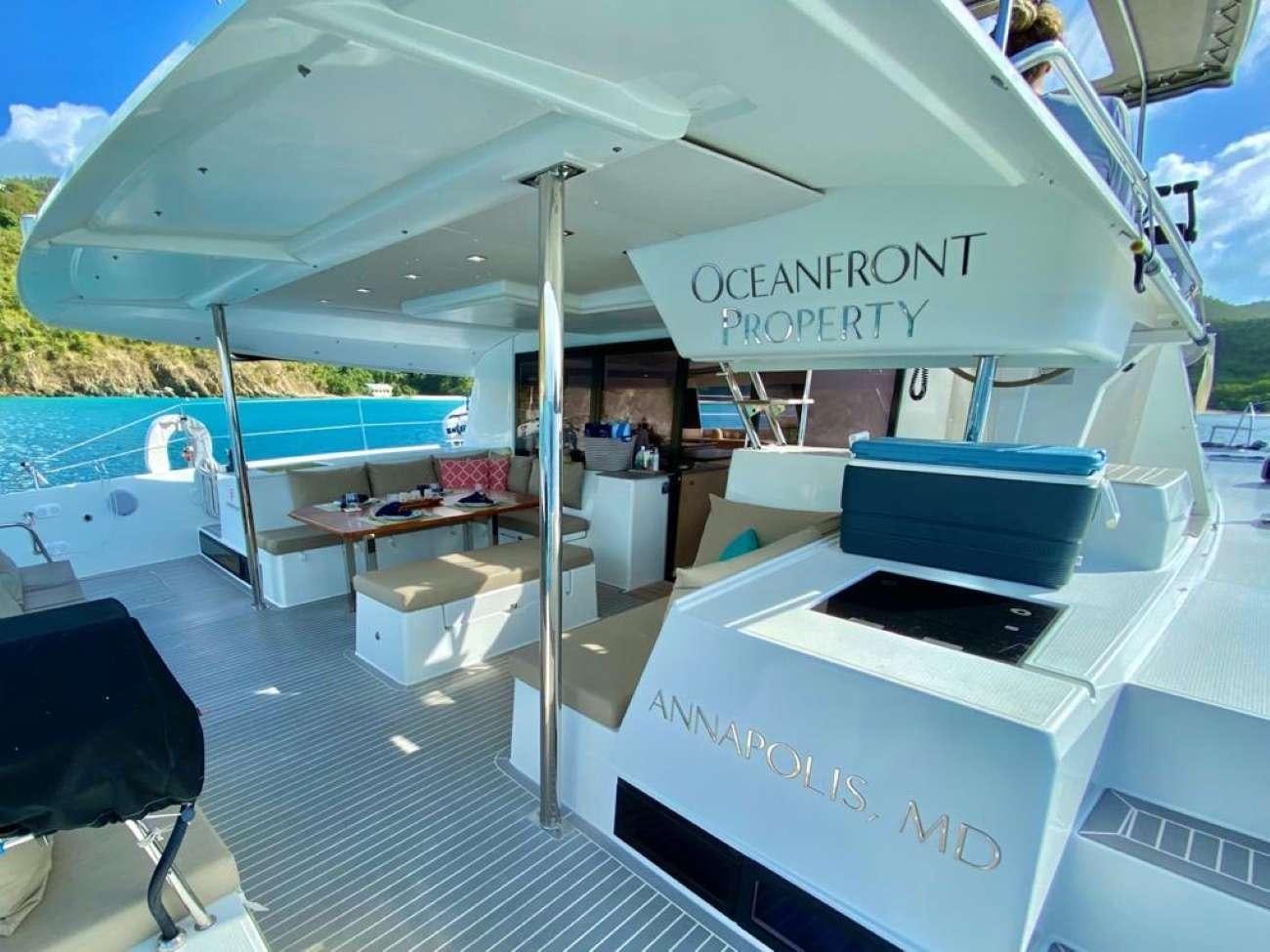 a boat on the water aboard OCEANFRONT PROPERTY Yacht for Charter