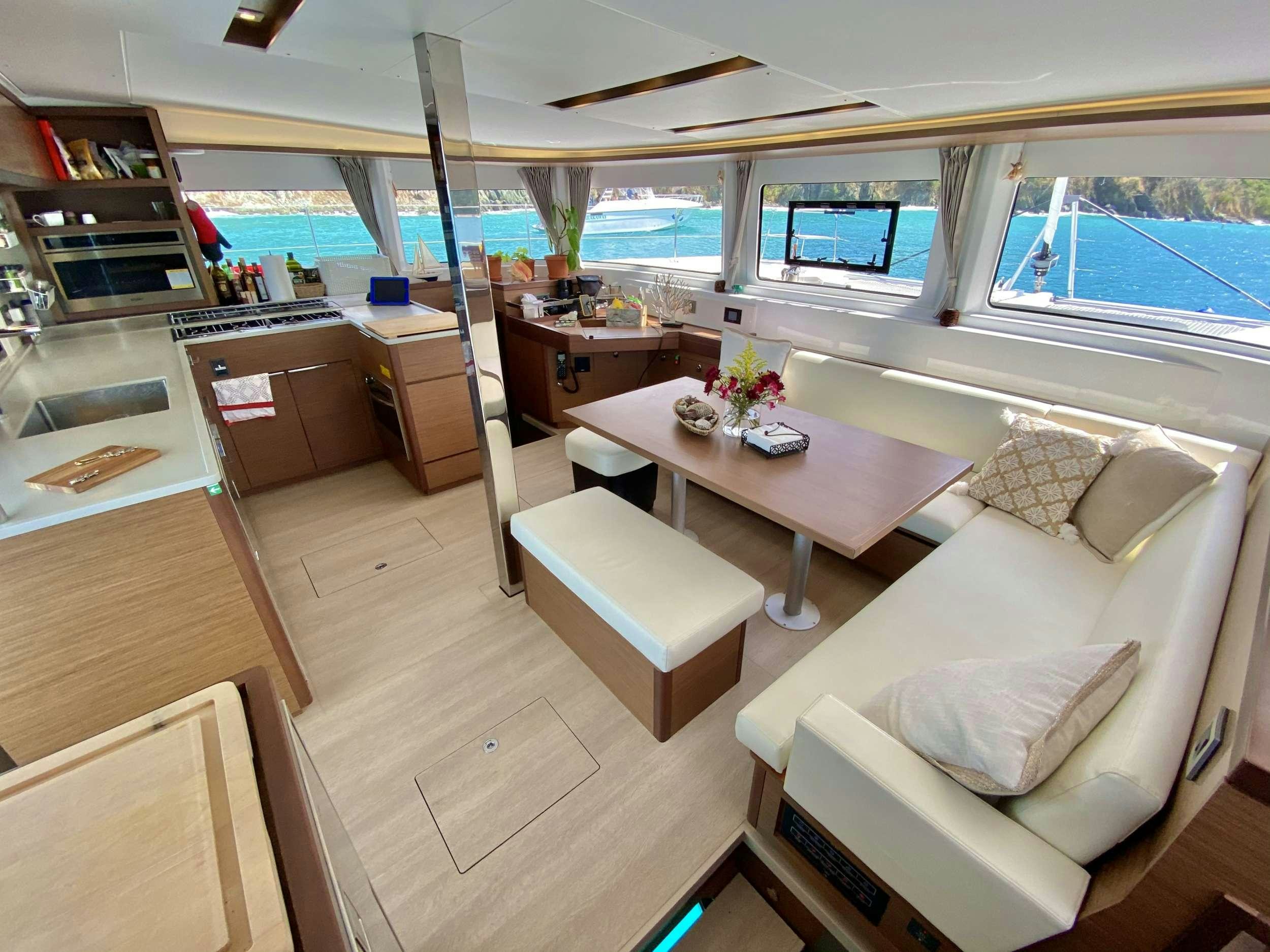a kitchen and living room aboard EASIR II Yacht for Charter
