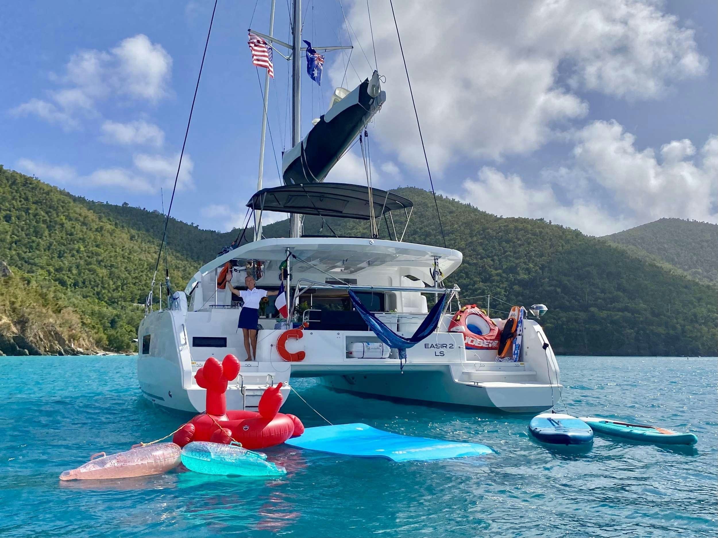 a boat with a sail on the water aboard EASIR II Yacht for Charter