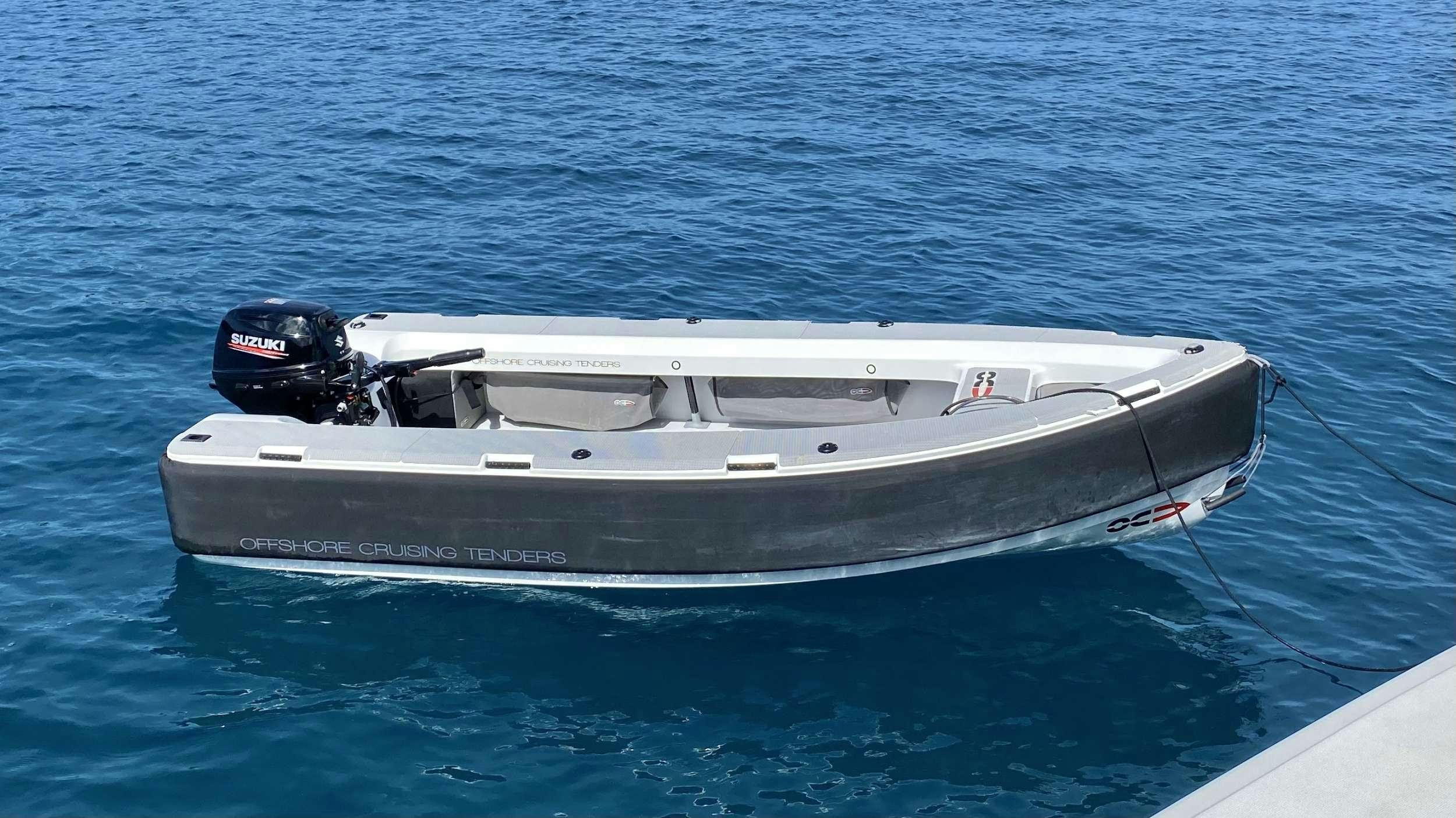 a white boat in the water aboard FREESTYLE Yacht for Charter