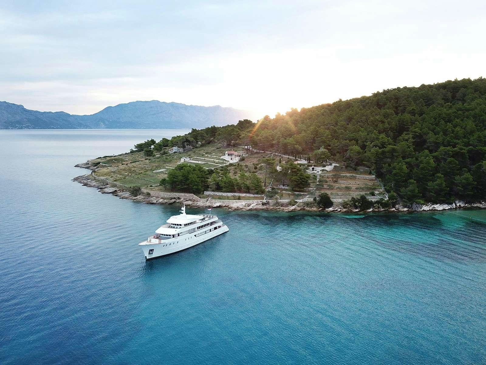 a boat sailing on the water aboard YOLO Yacht for Charter