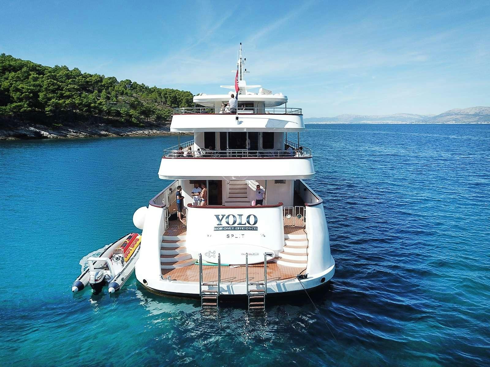 a boat on the water aboard YOLO Yacht for Charter