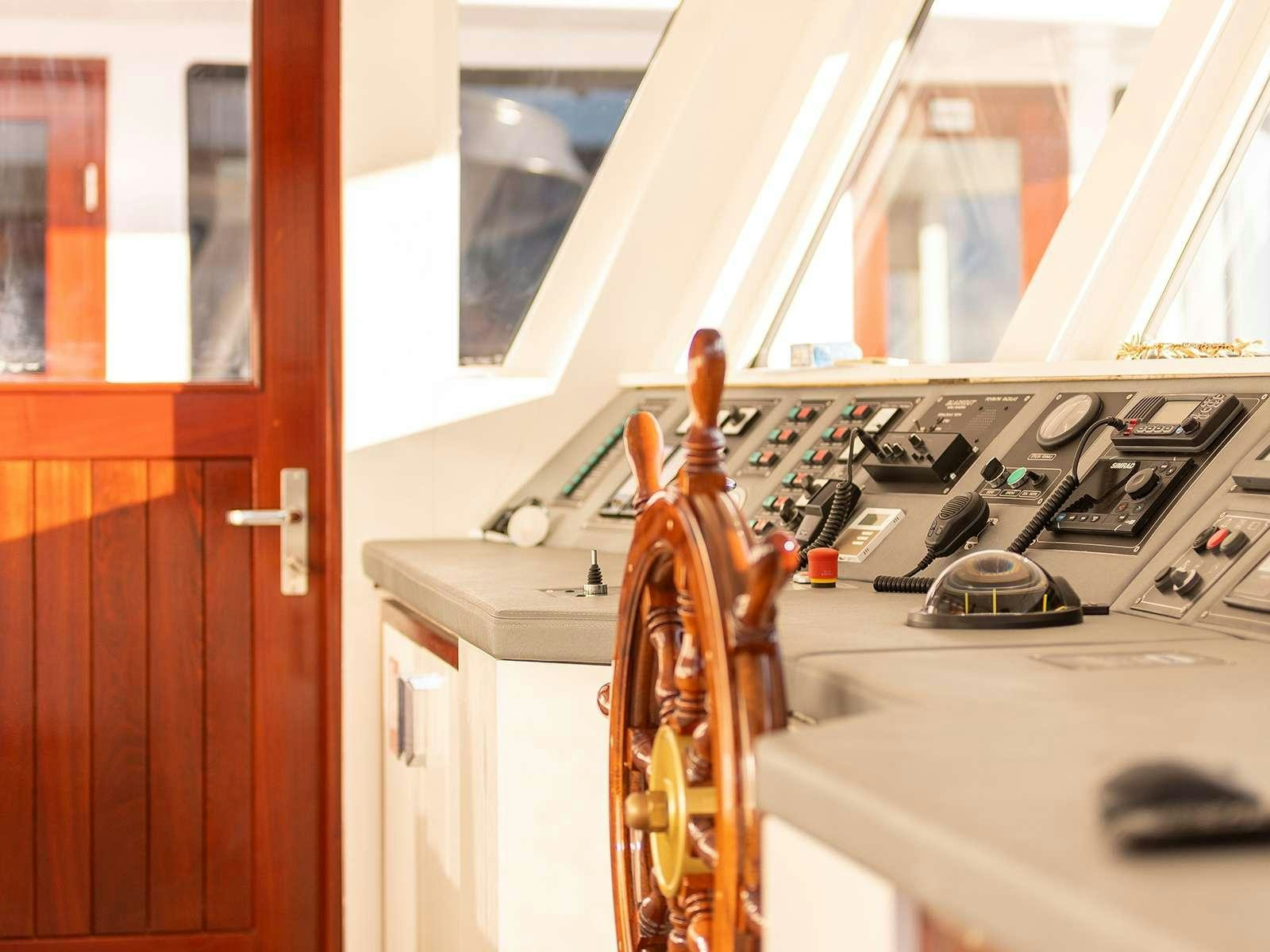 a toy on a stove aboard YOLO Yacht for Charter
