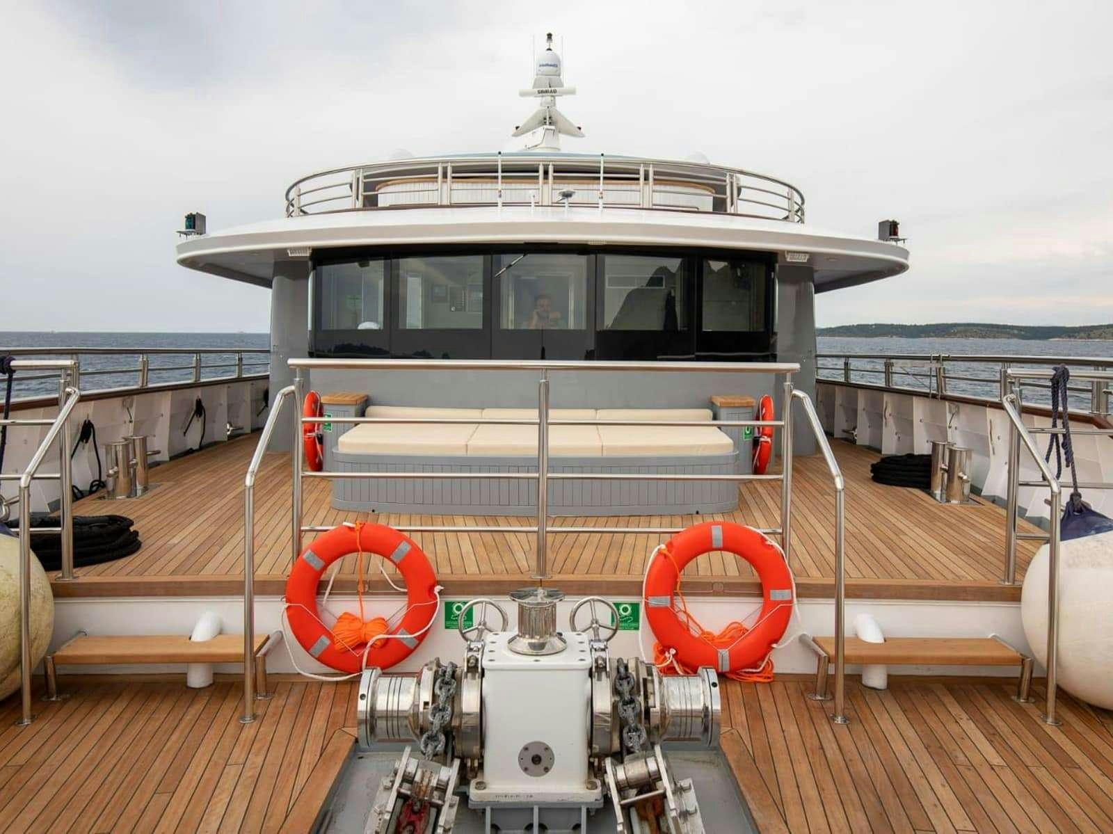 a boat on a deck aboard FREEDOM Yacht for Charter