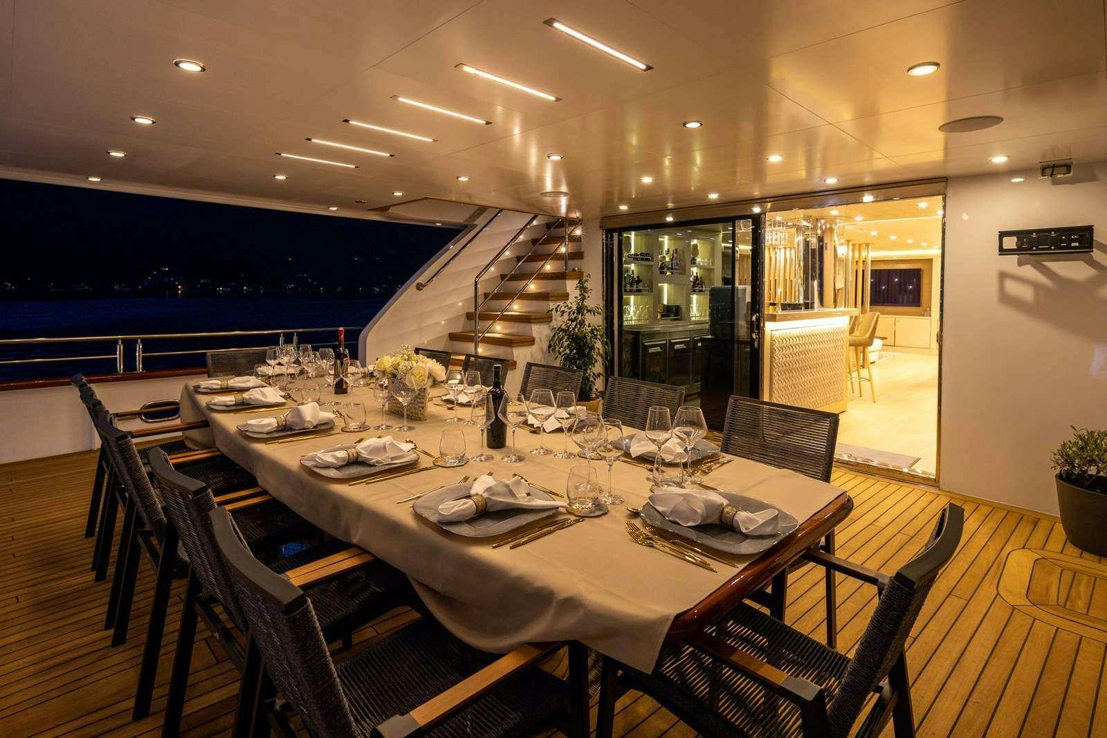 a dining room with a large table aboard LOVE STORY Yacht for Charter